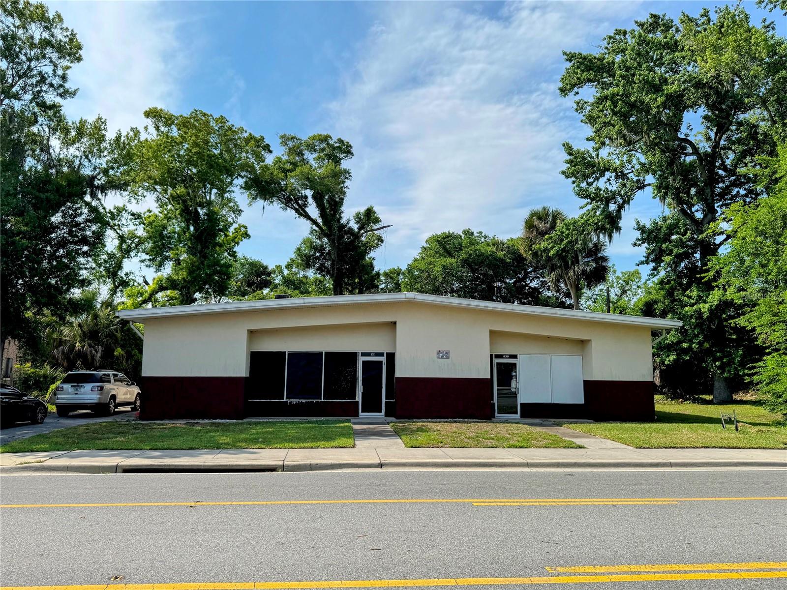 Prime Midtown Daytona Beach redevelopment and adaptive reuse opportunity within the City’s targeted Community Redevelopment Area (CRA). Positioned along the evolving Orange Avenue corridor, this ±6,300 SF commercial warehouse/flex property offers exceptional potential for owner-users, investors, developers, and creative repositioning opportunities.

The existing structure supports immediate warehouse/flex functionality while also presenting compelling long-term upside for mixed-use redevelopment, professional office, medical, live-work, retail, restaurant, fitness, or adaptive reuse concepts. Two adjacent vacant parcels may also be available separately, creating potential assemblage opportunities for expanded development footprint, parking, or future redevelopment flexibility.

Located within Daytona Beach’s Midtown CRA district, the property may qualify for multiple City redevelopment and improvement incentive programs designed to encourage commercial investment, facade enhancement, landscaping, and business growth within the corridor. Significant redevelopment incentives may also exist at the State level for qualifying mixed-use or residential redevelopment projects under Florida’s Live Local Act.

Strategically located near downtown Daytona Beach, Bethune-Cookman University, major transportation corridors, and ongoing public/private redevelopment initiatives. A rare opportunity to secure a highly flexible commercial asset within one of Daytona Beach’s most actively targeted growth corridors.