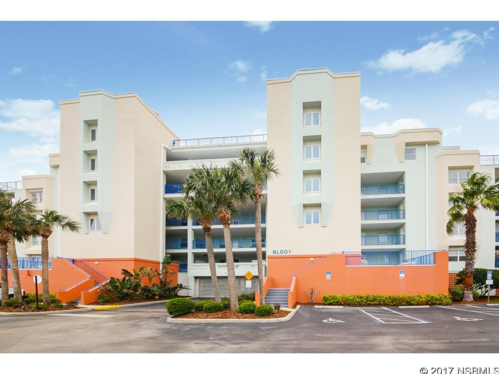Lovely residence just steps to the ocean.  Enjoy the peeks of the ocean from the living room and patio area!  Second floor, corner unit in the Ocean Walk Condominium Communityâ Building One â in mint condition.  Pride of ownership shines throughout in this three bedroom, two bath unit with three patio areas to enjoy.  Lovely open floor plan.  Open kitchen area to living and dining room.  Carpet and new tile throughout.  Recently professional painted on the interior.  Inside laundry area.  AC 2011.   Master suite has private balcony.  Master bath has jacuzzi tub and shower with dual sinks.  Secured, gated entry way, covered parking with secured garage.  Two clubhouses, two lighted tennis courts, lighted basketball hoop, sauna, movie room, two pools with spas. Shuffle board and exercise rooms.  Nature trail out to the river to walk and launch kayaks or SUPS.  Close to the beach walk over which will take you right to the no drive beach.  Just a short drive to the Canaveral National Seashore.  Minutes to shopping and dining and Flager Avenue. ;Water: City