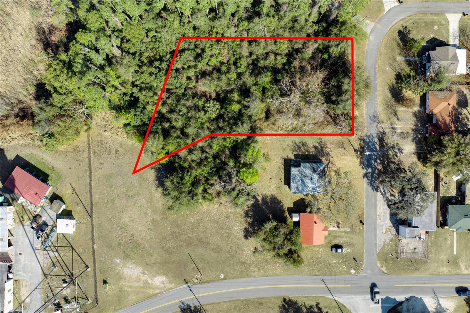 Build your dream home in the peaceful, scenic hills of Howey-in-the-Hills where wide open skies, rolling terrain, and sparkling lakes create the kind of setting you just can't find in the city. This just-under-an-acre vacant lot offers the freedom and flexibility you've been looking for - no HOA, no restrictions, and tucked away from the main road for added privacy and quiet. Whether you're envisioning a custom estate, modern farmhouse, or cozy retreat, there's plenty of room to design your home, add a pool, park your toys, or simply enjoy space to breathe. Beyond your homesite, the lifestyle is what truly makes this location special. Spend weekends boating or fishing on the Harris Chain of Lakes, teeing off at Mission Inn Resort & Club, or dining local. Charming downtowns filled with boutiques, cafés, and festivals are just minutes away in Mount Dora and Clermont. Commuting is easy too, with quick access to SR-19, CR-48, and Florida's Turnpike - putting shopping, dining, and everyday conveniences nearby and all the attractions of Orlando within about 45 minutes. If you've been dreaming of space, privacy, and a slower pace ... without sacrificing convenience ... this is your opportunity to create the home and lifestyle you've always wanted. Come walk the lot and imagine the possibilities.