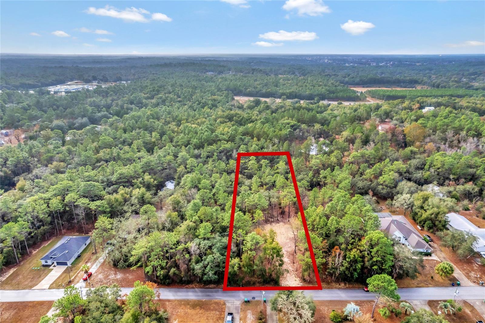 Build your dream home on this serene and spacious homesite, just shy of 1 acre. Nestled in the peaceful Presidential Estates section of Citrus Hills, this lot is the perfect canvas for your forever home. With no mandatory HOA fees, you’ll have the freedom to bring your vision to life. Surrounded by well-maintained homes and located in a no-flood zone, this property offers both security and charm.

For golf enthusiasts, this location is a dream come true! Situated near some of the area’s top-notch golf courses, it offers easy access to world-class greens, pristine fairways, and a vibrant golfing community. Whether you’re an avid golfer or just love the lifestyle, this homesite provides the perfect opportunity to design and build a home that complements your passion.

Enjoy the convenience of being just a short drive from excellent restaurants, shopping, and top-notch medical facilities. Take a drive to see this stunning property for yourself—opportunities like this don’t come around often. Act now because it won’t last long at this price!