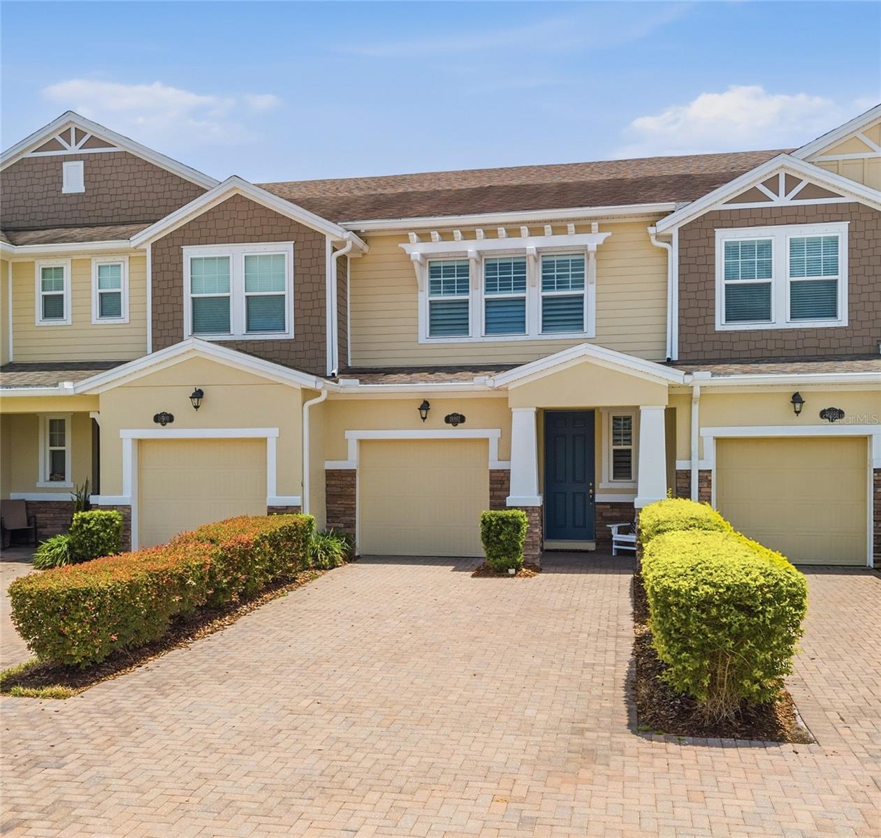 Welcome Home to this Beautifully appointed 3-bedroom, 2.5-bath Townhouse offering 1,700 sq. ft. of stylish and comfortable Living Space, complete with your own Garage. Thoughtfully designed for both everyday living and entertaining, this home features an open-concept layout enhanced by plantation shutters throughout, adding timeless elegance and privacy. The spacious kitchen is the heart of the home, showcasing a large center island, breakfast bar seating, and a custom pantry that provides exceptional storage and organization. The adjoining living and dining areas create a seamless flow, perfect for gathering with family and friends. A custom built-in cabinet with a rich wood surface and matching floating wall shelves adds both character and functionality, creating the perfect space for storage and a stylish display area. Designer touches can be found throughout the home, including upgraded light fixtures and ceiling fans, custom backsplash, stylish pendant lighting, and recessed lighting that create a warm and inviting atmosphere while enhancing the home's modern appeal.
Retreat to the oversized Primary Suite, offering plenty of space for a sitting area or home gym space. The luxurious En-suite Bath features a dual-sink vanity, step-in shower, and an expansive walk-in closet. Two additional Bedrooms and a full Bath provide flexibility for guests, family members, or a home office. Beyond the home, enjoy an exceptional amenity-rich lifestyle. Residents have access to a resort-style community pool, pickleball courts, basketball courts, a dog park, scenic lake with a dock, walking trails surrounding the water, a playground, and a covered picnic pavilion—providing endless opportunities for recreation, relaxation, and outdoor enjoyment. Combining desirable upgrades, generous living spaces, and outstanding community amenities, this move-in-ready home offers the perfect blend of comfort, functionality, and lifestyle. Don't miss the opportunity to make this exceptional property your next home.