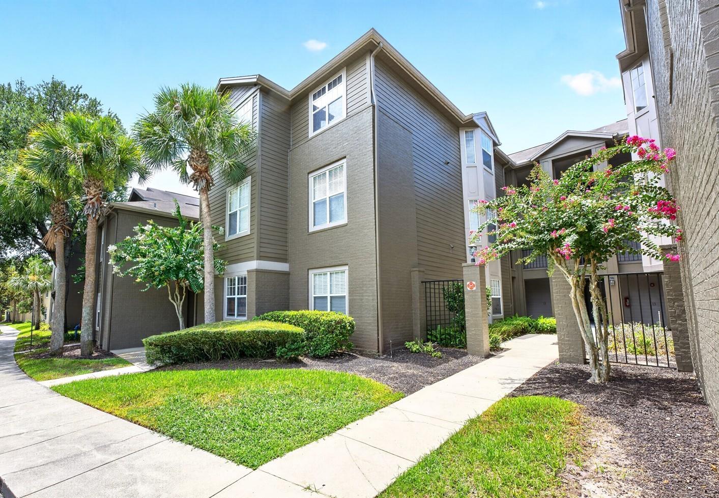 Welcome to this beautifully maintained 3-bedroom, 2-bath unit in the GATED Residences at Sabal Point, where LOW MAINTENANCE LIVING meets an unbeatable Longwood location! Recent updates are already complete, including a BRAND NEW RANGE (2026), BRAND NEW WASHER/DRYER (2026), NEW KITCHEN SINK (2026), and an UPDATED A/C (2024), additionally the screened balcony will receive NEW SCREENS before closing for added peace of mind. The interior delivers a light-filled, OPEN CONCEPT LAYOUT where the spacious living and dining areas flow effortlessly into the well-equipped EAT-IN KITCHEN, creating a comfortable space for both everyday living with family or entertaining friends. Large windows fill the home with natural light, and the SCREENED BALCONY offers the perfect outdoor space to enjoy your morning coffee or unwind at the end of the day. The generous PRIMARY SUITE features DUAL WALK-IN CLOSETS and a private en-suite bath, while two additional bedrooms provide flexibility for guests or a home office. The covered front entry and GARAGE with an additional private PARKING SPACE add everyday convenience and valuable storage. Residents of this FNMA APPROVED community enjoy RESORT STYLE AMENITIES including a solar HEATED POOL, clubhouse, FITNESS CENTER, tennis courts, and dog park. The monthly condo association fee also includes water, sewer, trash removal, and FIBER INTERNET, making ownership even more convenient. Perfectly positioned with easy access to Wekiva Springs Road, SR 434, and I-4, you will be just minutes from shopping, dining, everyday conveniences, and outdoor recreation at Wekiwa Springs State Park and Lake Apopka. If you have been searching for a spacious, MOVE-IN READY condo in a desirable gated community with outstanding amenities, this is one you won't want to miss. Easy to show - call today to schedule a tour!