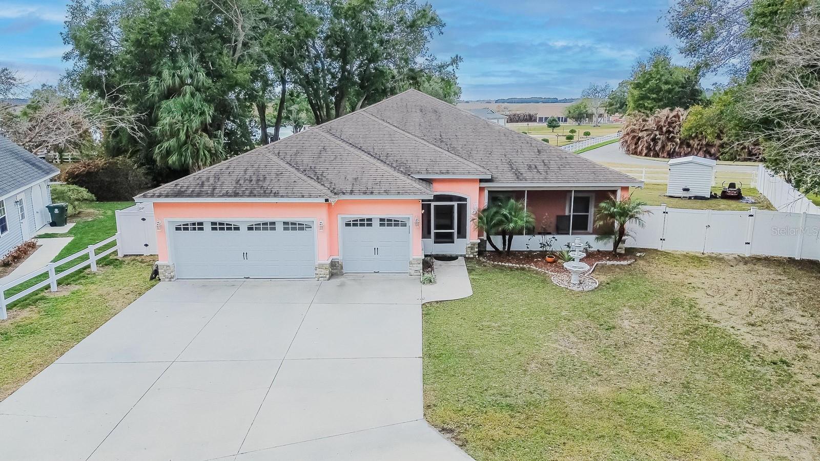 Price Improvement – Motivated Seller! Welcome to this spacious and versatile home in Lake Alfred offering the freedom of NO CDD and NO HOA, all situated on an oversized .30-acre lot with room for RV and boat parking. With 2,900 square feet, 3 bedrooms, 3.5 bathrooms and a 3-car garage, this home delivers flexible living spaces, functional design and plenty of room to spread out both inside and out.
Inside, ceramic tile flooring flows throughout the entire home with absolutely NO carpet. The thoughtfully designed split-bedroom floor plan offers both privacy and flexibility, while the open concept main living area creates an inviting space for everyday living and entertaining. Formal living and dining rooms provide additional gathering spaces, while the large family room at the back of the home opens to a dinette area and overlooks the outdoor living spaces.
At the center of the home, the spacious kitchen is designed for both functionality and entertaining, featuring granite countertops, extensive counter space, a pantry closet and a full stainless steel appliance package including a refrigerator, range, microwave, dishwasher and disposal.
The primary suite is privately positioned toward the front of the home and features an en-suite bathroom with a double sink vanity, walk-in shower and a spa bath with massage jets. Bedrooms two and three are located on the opposite side of the home and share a full bathroom with a tub/shower combination.
This thoughtfully designed home also offers multiple flex spaces to fit a variety of lifestyles, including a unique hidden bonus room with a powder room ideal for a media room, home office, lounge, fitness space or creative studio. An enclosed Florida room sits just off the family room and provides access to the screened lanai and the bonus room creating even more possibilities for entertaining, hobbies or guest space.
Outside, the fully fenced backyard offers privacy and plenty of room to enjoy the outdoors, while the oversized lot easily accommodates RV and boat parking.
Conveniently located near Winter Haven, Lakeland and major highways, with easy access to lakes, dining, shopping and Central Florida attractions, this home offers the perfect balance of space, flexibility and convenience.