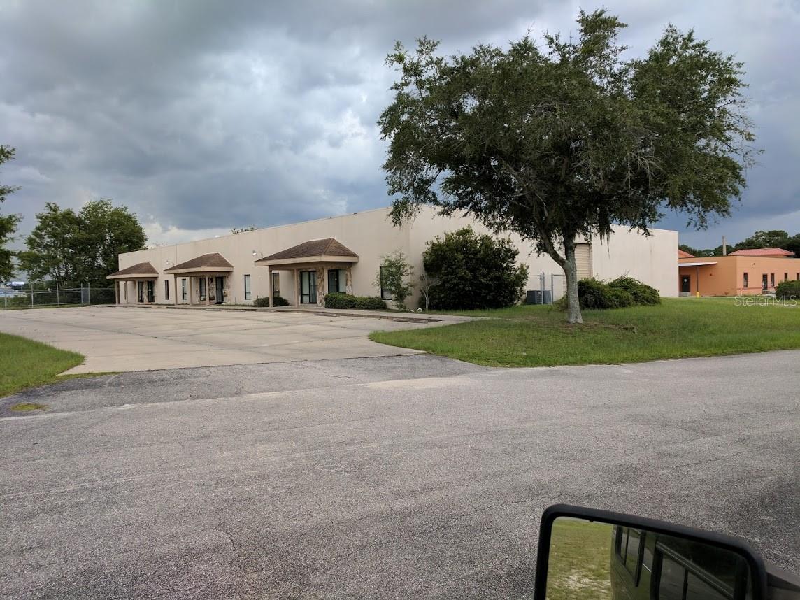 Very clean warehouse with 4 offices, One-ADA bathroom, One overhead door with a high loading dock. 2,000 SQ FT warehouse clear span.
