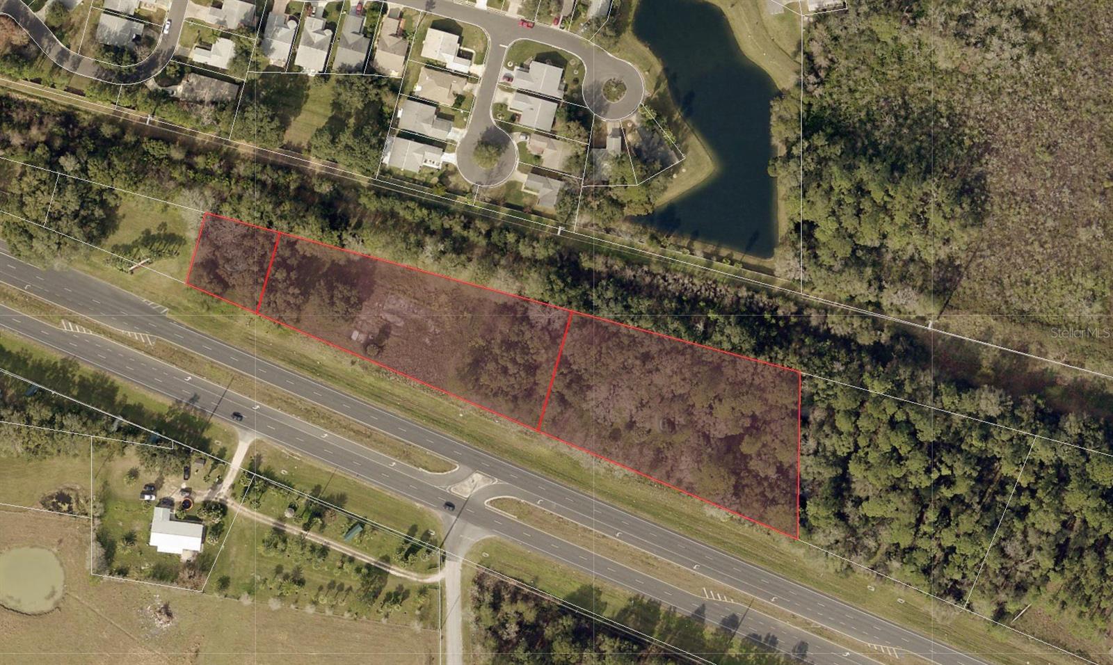 3.11 +/- acres per 2008 survey with 870’ frontage on SR 44. Excellent visibility, less than a mile to The Villages. Located east of CR 468, MorseBlvd. and The Villages BOOMING expansion area. Lake Deaton Plaza is 1.5 miles west of this location with Publix, Campus USA Credit Union,Walgreens, Chase Bank, Piesanos Stone Fired Pizza, Circle K and more. Property is an out parcel to entrance of Pennbrooke Fairways, with 1,200 homes on 538 acres, a 55+ community. City utilities nearby and community water possibility. FLU Codes: Rural Transition, Zoning: CP Planned Commercial. AADT 25,000 cars per day (FDOT).