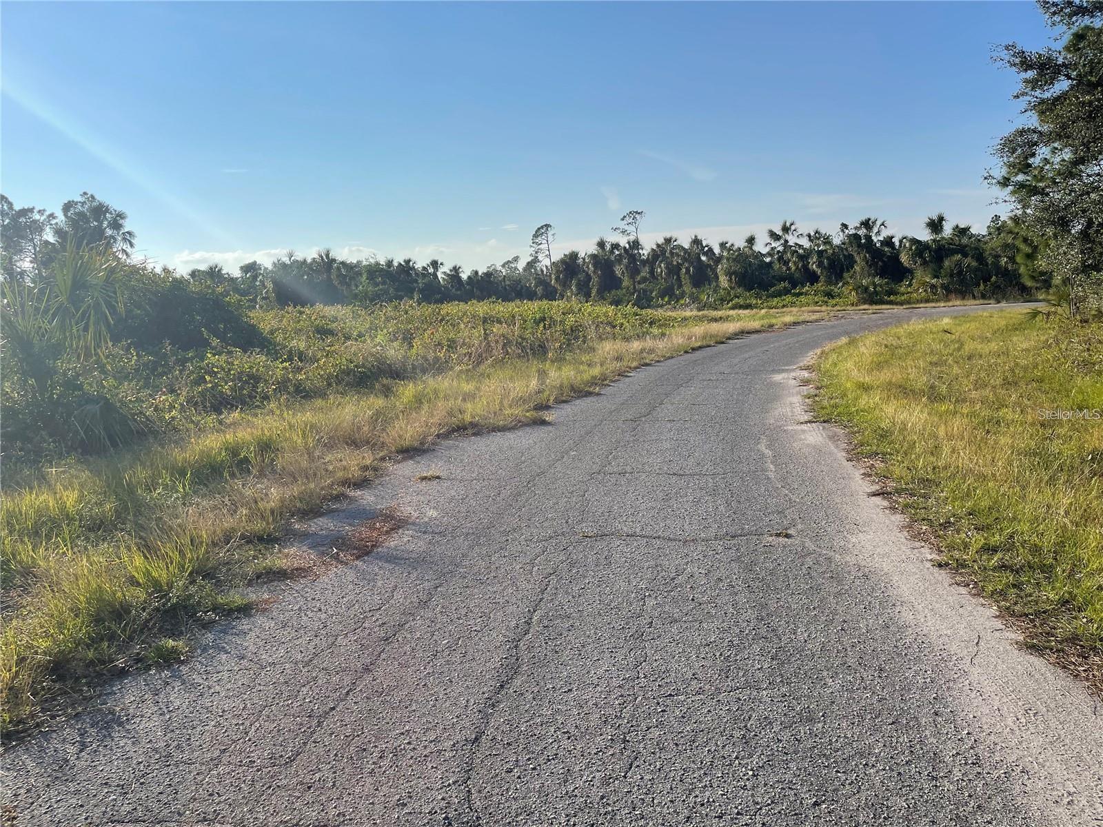This spacious buildable lot, just over 1/2-acre is located on an active canal within the recently rezoned AC-6 area at the southeast corner of North Port. The AC-6 zoning supports commercial, industrial, and multi-family developments, encouraging the growth of self-sustaining "live, work, play" communities. The property is conveniently positioned within close proximity to the Atlanta Braves Spring Training Baseball Stadium, North Port New Aquatic Center, Historic Warm Mineral Springs, numerous shopping and dining options, as well as several Southwest Florida Gulf Coast Beaches. It is also near North Port's future I-75 Interchange Exit Ramp Project, ensuring easy access north to Sarasota and Tampa or south to historic Punta Gorda and Fort Myers. Seller financing is available at competitive rates and terms.
