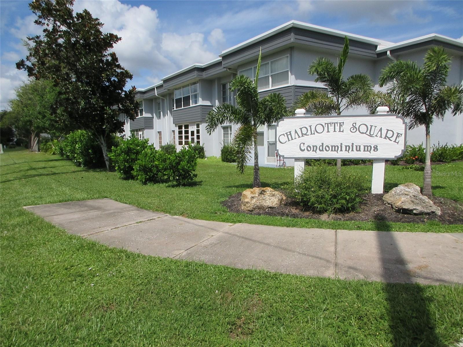YOU DON'T WANT TO PASS UP THIS BEAUTIFULLY UPDATED, TURNKEY, 1st FLOOR CORNER UNIT. Centrally located within 5 miles of PUNTA GORDA ISLES & all it has to offer. Updates include COREtec Luxury Vinyl Plank Flooring throughout, Fresh Paint, Remodeled Kitchen with Solid Wood Cabinetry, Corian Counters, Tile Backsplash, Newer Appliances, Remodeled Bathroom with Walk-In Shower AND Overhead Heat Lamp. Florida Room has tile floor and Florida Room's exterior door leads out directly to your Parking Space. Building has been NEWLY Painted (2025), NEW ROOF (2024) & Unit has NEW A/C (5/2024). Parking area was recently resurfaced. Port Charlotte & Punta Gorda offer plenty of entertainment, including Restaurants, Shopping, Fishing, Boating, Golfing, etc.  Seller is anxious to move closer to family in North Central Florda, so bring your offers.