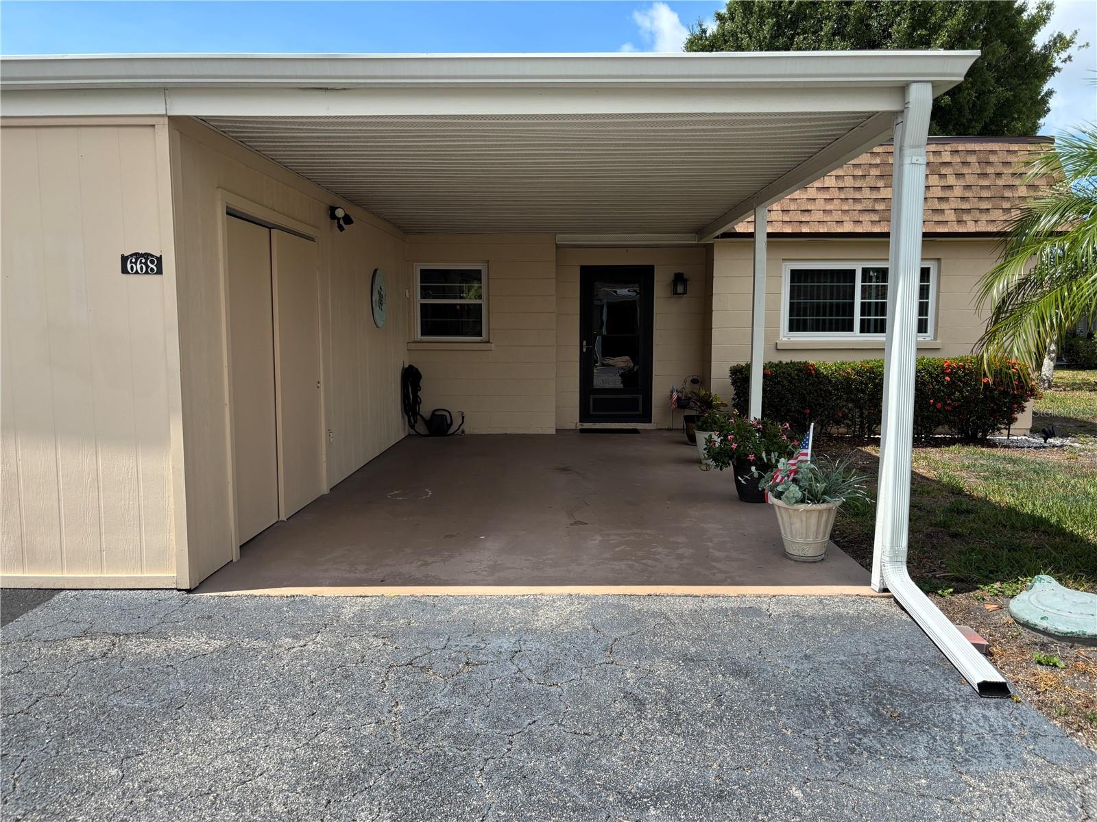 Welcome to this beautifully maintained end unit in Park Acres Estates. For added security and peace of mind, this 2 bedroom 1 and 1/2 bathroom villa offers newer impact resistant windows. The HVAC and hot water heater were replaced in 2023.  New roof, shingles, and gutters replaced in 2025. Year round living or seasonal residents will enjoy all the amenities Park Acres provides. Heated swimming pool, shuffleboard, and clubhouse featuring; a full kitchen, library, fitness center, and billiard room. A very active community, Park Acres Estates is conveniently located close to Sarasota Airport, shopping, dining, and the beautiful Gulf Beaches. Low HOA fees also provide internet and cable. This villa is available fully furnished upon request with an additional fee.