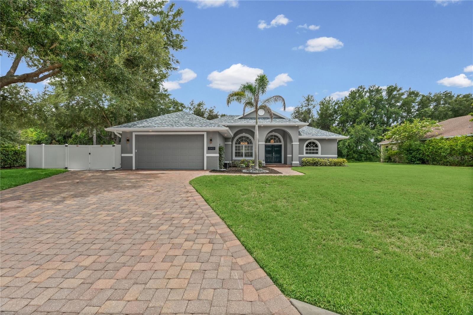 Private cul-de-sac location on a preserve oversized lot in highly sought after Mill Creek with a beautiful, caged pool with a large deck. This home has been meticulously maintained with many recent updates, like the new modern kitchen with the waterfall quartz countertop and eat at bar, and separate coffee station. From the minute you enter through the double door entry you feel and see the openness and modern design, from the modern lighting to the new floors, electric fireplace and entertainment wall. The large patio door pockets so you can open the house up to the beautiful pool with feathered edge design, and newly resurfaced pool. The floor plan is open and flowing with 4 bedrooms, 4 bathrooms and separate dining room. this home has two master suites, one is hidden with a bookshelf door, having its own living room, a real bonus for a teen wing, extended family or live in nanny.
The landscaping has recently been updated to include extra-large paver driveway with a secured parking area behind the gate, great for motorhomes or boats. The rear yard is very private and extends the property for a great place for a firepit on those chilly evenings, or just for relaxing.
The home has been recently painted inside and out with top quality paint with a 7-year warranty and has a gutter system. the roof is also new with a 30-year warranty. there are so many upgrades that I attached a separate list showing all the updates and improvements.
This house needs nothing and is in move in condition.
Come see your new home before someone else grabs this beauty!