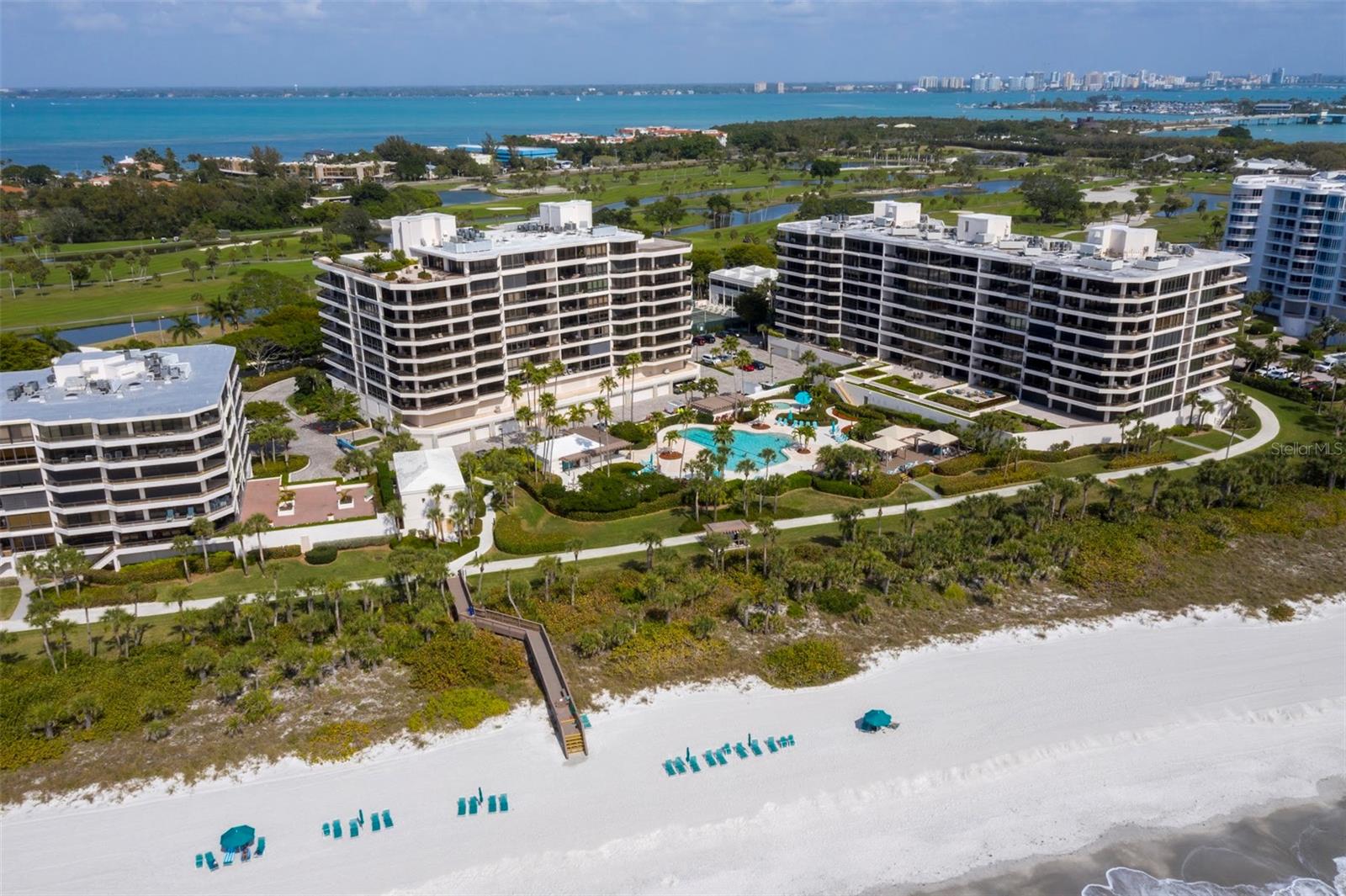 Welcome to refined coastal living at The Sanctuary—an exclusive gulf-side enclave tucked behind the gates of the Longboat Key Club. This beautifully updated 6th-floor residence offers 2BR plus den, 2.5BA, and over 2,375± sq. ft. of sophisticated interiors paired with sweeping wrap-around terraces that capture panoramic views of the Gulf of Mexico, the Links golf course, and the Sarasota skyline.  Thoughtfully renovated with a designer’s eye, the residence showcases rich wood flooring, high-impact glass throughout, and light-filled living spaces that seamlessly connect indoors and out. The gourmet kitchen is both stylish and functional, featuring crisp cabinetry, solid-surface countertops, stainless appliances, and a center island ideal for casual dining or entertaining.  The primary suite is a private retreat with terrace access, stunning Gulf views, a spacious walk-in closet, and a spa-inspired bath. Guests are comfortably accommodated in a separate suite, while the den offers flexibility for a home office or additional sleeping space.  Residents enjoy a true resort lifestyle with private deeded beach access just steps away, 24-hour gated security, under-building parking, on-site management, heated pool and spa, Har-Tru tennis courts, and a fitness center. Ownership also places you within the coveted Longboat Key Club, with world-class golf, tennis, and beachfront amenities. Perfectly positioned on the south end of Longboat Key, you’re just minutes from the renowned shopping, dining, and social scene of St. Armands Circle, along with the vibrant arts, culture, and waterfront restaurants of downtown Sarasota. For those seeking a luxury Gulf Coast lifestyle defined by elegance, privacy, and activity, this exceptional residence delivers. Schedule your private showing today and experience The Sanctuary at Longboat Key firsthand.
Bonus space is currently set up as a den with sleeper sofa and sliding door for privacy but can easily be converted back to a third bedroom with closet”.