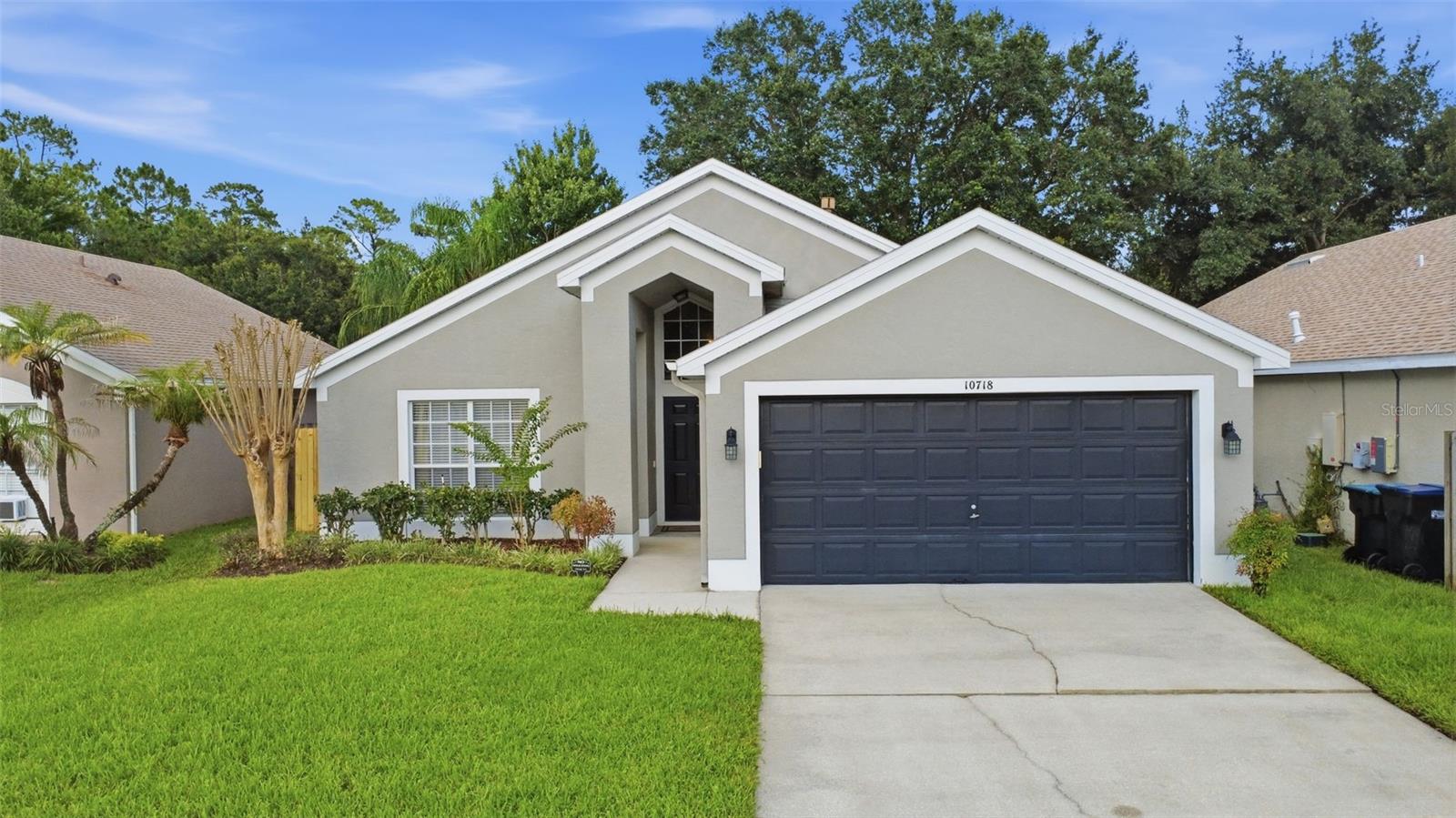 Looking for a move-in ready home in Orlando with major updates already completed? This beautifully maintained 3-bedroom, 2-bath home offers the perfect combination of comfort, convenience, and peace of mind. Whether you're a first-time homebuyer, downsizing, relocating to Central Florida, or searching for a solid investment property, this home checks all the boxes.

Step inside to an inviting open floor plan featuring soaring vaulted ceilings, abundant natural light, and durable ceramic tile flooring throughout—no carpet to maintain. The neutral color palette creates a bright, welcoming space that's ready for your personal style.

The kitchen is designed for both everyday living and entertaining with granite countertops, a gas range, an eat-in breakfast nook, and plenty of cabinet and counter space.

The desirable split-bedroom floor plan provides added privacy, with the spacious primary suite tucked away from the secondary bedrooms. The primary bath features dual vanities and generous space, creating a comfortable retreat at the end of the day.

Major updates include a NEW HVAC system (2025), gas water heater (2024), and a roof approximately 12 years old, allowing buyers to move in with confidence.

Step outside to the screened-in patio—perfect for enjoying your morning coffee, relaxing after work, or entertaining family and friends while enjoying Florida's beautiful weather.

Location is another standout feature. Conveniently located near State Road 417, you'll enjoy quick access to Orlando International Airport (MCO), the University of Central Florida (UCF), shopping, dining, medical facilities, major employers, and Downtown Orlando. Plus, Florida's beautiful Space Coast beaches are only about 30 minutes away.

If you've been searching for a move-in ready Orlando home with high ceilings, granite countertops, a gas stove, ceramic tile floors, updated mechanical systems, a screened patio, and an excellent location, this is one you won't want to miss. Schedule your private showing today!