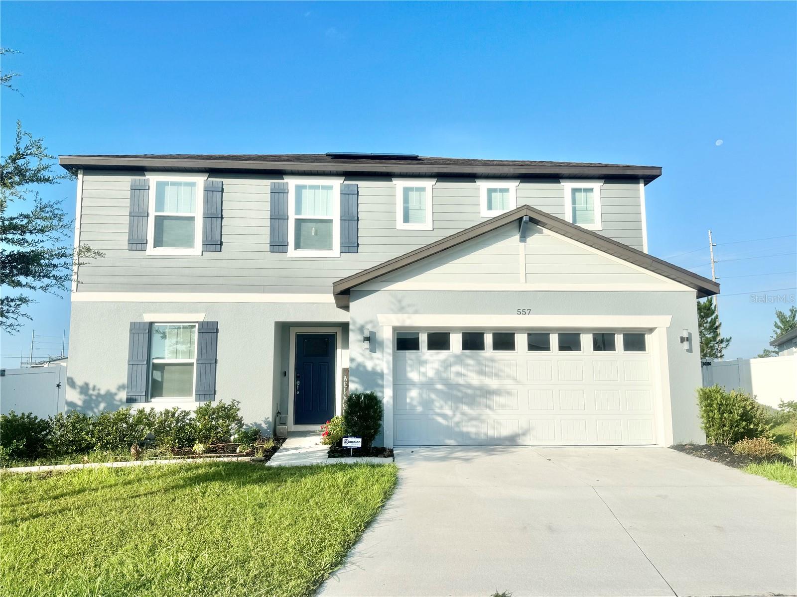 OTHER PHOTOS COMING SOON! Welcome to this like-new 2023-built corner-lot home. This 4-bedroom, 2.5-bath, 2 car garage home feels just like new and offers the perfect blend of modern design, comfort, and functionality. The open concept layout features a spacious kitchen with a large quartz island, generous countertop space, and seamless flow into the dining area and gathering room perfect for everyday living and entertaining.

The first floor includes a versatile flex room, ideal as a home office, study, playroom, or potential 5th bedroom, along with a convenient half bath. You’ll also appreciate the coat closet for extra storage, plus an additional storage closet under the stairs. The covered, screened lanai with a ceiling fan offers the perfect space to enjoy Florida’s outdoor lifestyle.

Situated on the largest fenced yards in the community, this property features gates on both sides for easy access and plenty of room for outdoor activities. Additional upgrades include high ceilings, a Smart Home system, a whole home water filtration system, epoxy coated garage flooring for added durability, and an installed solar panel system. The solar panels are currently financed, and the buyer will need to qualify to assume the existing solar loan.

Upstairs offers a spacious loft that can be used as a second living area, game room, media room, or home gym, along with a convenient laundry room. The primary suite features a spacious bedroom with walk-in closet, along with a primary bathroom offering dual sinks and a linen closet for added storage and convenience. The three additional bedrooms share a full bathroom, providing a functional layout for guests.

This home is located in a small, quiet community offering a playground and open green spaces, creating a comfortable and inviting neighborhood feel. The low traffic setting adds privacy and convenience, making it ideal for everyday living.

Ideally located just 7 minutes from I-4, this home offers easy access to both Orlando and Tampa, as well as nearby shopping, dining, and entertainment. A new shopping plaza is planned directly across from the community, which will include a Publix supermarket and additional retail stores, adding future convenience and value.

Don’t miss the opportunity to own this spacious, upgraded home in one of Central Florida’s growing communities!