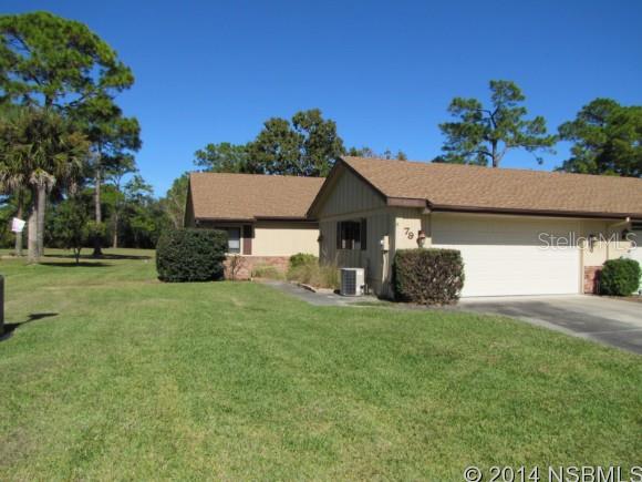 GOLF FRONT - Ready to move in, freshly painted interior and exterior, clean and neat, just waiting for new owners to move in. Great location on fairways, with spacious Florida room with its own A/C unit, so you can open all the windows and use it as a screened room and enjoy cool breezes, or keep windows closed and use as additional 260 sq. ft. of living space that is additional to home's 1,337 sq. ft. of living space under main roof. Newer architectural shingle roof, new refrigerator 2014. Oversized 2-car garage is nice and wide and features new storm-rated garage door and electric opener. Two nice-sized bedrooms and baths, 2 linen closets in hall way, spacious eat-in kitchen overlooks front entry screened porch and entry walkway.  If you are looking for a move-in ready home on the golf course, at an affordable price, look no further. Located on nice and wide street near wide turn ........ lots of street side parking for your guests.  Nestled between 2 golf courses, centrally located and near everything, including the beach. Two community pools available by optional membership, one is heated!  Low HOA dues provide you standard cable TV, 100% operation, maintenance and water to sprinkler system, subterranean treat and repair termite bond, and common area maintenance - best value in town! ;Water: City