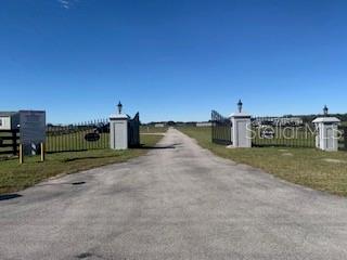 Beautiful 140+/- in Sumter County, FL.  Over 2300 ft of frontage on I-75 ideal for additional billboard income.  Property has 3 manufactured homes on property with two of them currently leased (short or long term).  Large triple wide currently unoccupied.  Large steel barn as well.   Property has a special use permit for 2 wood recycling facility.  Appx 80-100 acres are being used for bahia hay.  New 24' wide paved driveway and electric gate.  Plenty of potential uses with county approval.  Over 2100' of frontage on Sumter CR 237.  Price based on a per acre amount of $20,000.  May be adjusted based on survey.