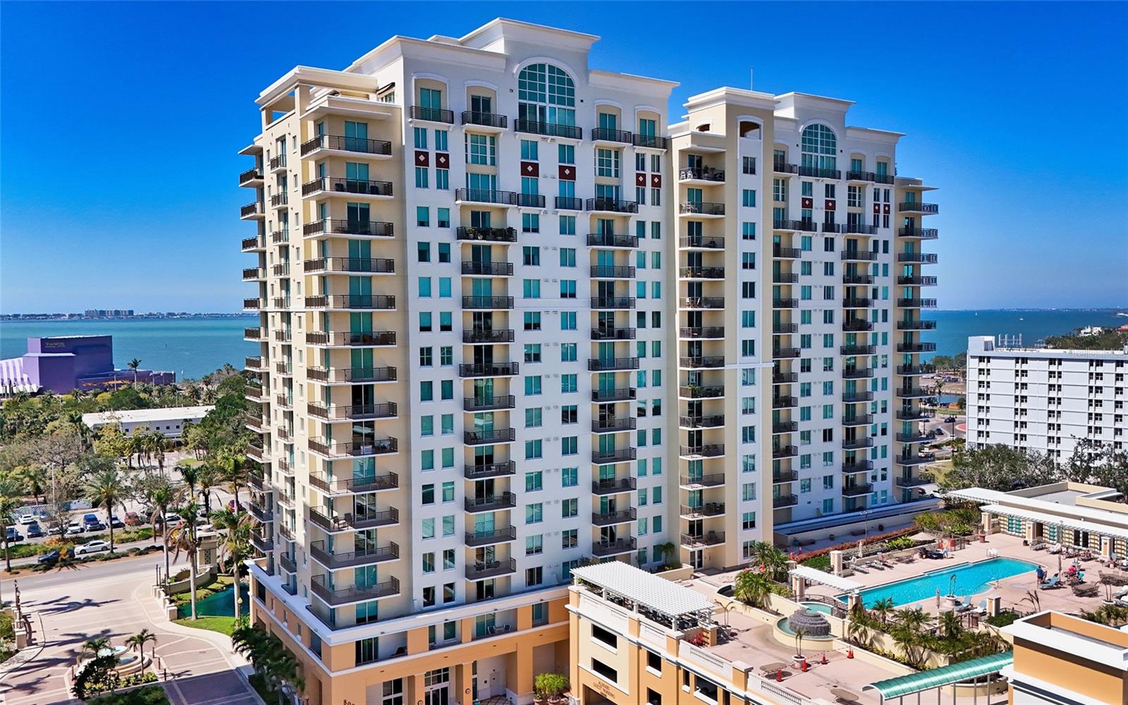 All the luxury of new construction in this fully remodeled and fully furnished residence in Alinari featuring high-end finishes without the new-build price. It’s the best value in Downtown Sarasota. Located in the Rosemary District, you’re steps from downtown’s premier dining, shopping and cultural attractions. Cross the street to the Quay and The Bay waterfront park, or take a quick drive over the Ringling Bridge to St. Armands Circle and the powder-soft sands of Lido Beach. Urban energy and coastal tranquility, all within reach.

The split two-bedroom, two-bath residence offers 1,323 square feet of open living space appointed with today’s most sought-after finishes, including luxury vinyl plank flooring in white oak, solid-wood cabinetry, quartz countertops, LED lighting with dimmers, premium fixtures and hardware, Lutron automated window shades, and stone accent walls in the foyer and dining room. The great room opens to a private balcony overlooking Alinari’s expansive green space. The kitchen features soft-close solid-wood shaker cabinets with designer brass hardware, Cambria quartz countertops, Elysium glass backsplash, and under-cabinet lighting. The primary suite offers a generous walk-in closet, a dedicated coffee bar, and an ensuite bath with dual-sink vanity, honed marble tile, and a frameless glass walk-in shower.

Alinari is a well-run association with an active social community. Resort-style amenities include concierge service, heated pool and spa with sun deck, private park, fitness center, sauna, theater room, social room, billiards room, business center, indoor bicycle storage, and guest suites for visiting family and friends. Wine enthusiasts will appreciate the climate-controlled wine room with personal storage lockers.

See it, love it — nothing to do but move right in.