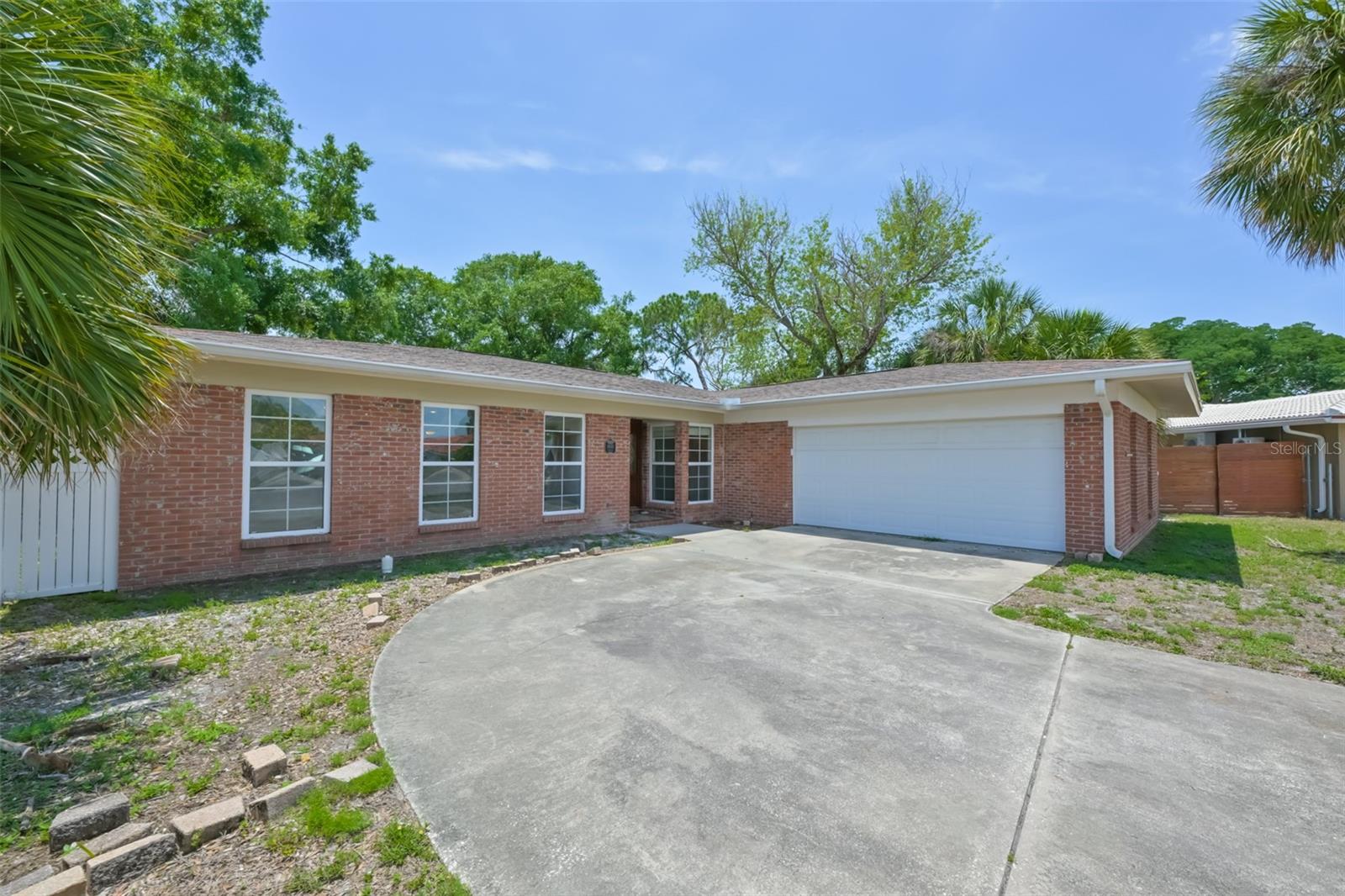 One or more photo(s) has been virtually staged. One or more photo(s) has been virtually staged.Welcome to this beautifully fully renovated 4-bedroom, 3-bath pool home with a 2-car garage, located on a quiet cul-de-sac with Tampa Bay water access through a community boat launch.Step inside and enjoy gorgeous luxury vinyl flooring throughout, along with major updates for comfort and peace of mind: a brand-new AC, new air handler and ductwork, and a water heater installed in May 2026. The roof was replaced in 2020, and you’ll feel secure with hurricane impact windows and doors.The heart of the home is an inviting kitchen featuring granite countertops and elegant white cabinetry, perfect for cooking and casual everyday dining. From there, unwind in the oversized enclosed, covered patio—a versatile space ideal for hosting gatherings or relaxing in comfort year-round.Outside, your private oasis awaits: a sparkling pool surrounded by lush landscaping—perfect for sunny afternoons and memorable entertaining.Retreat to the spacious primary suite with its private ensuite bathroom, while the additional bedrooms offer plenty of room for family or guests. With two additional full bathrooms that have been completely remodeled, convenience is built in for everyone.All of this is conveniently located in Tampa, close to shopping, dining, parks, and more, with quick access to major highways for easy commutes to downtown Tampa, the airport, and nearby attractions.Don’t miss your chance to own this exceptional home in a highly sought-after neighborhood! SELLER is offering a 5,000 credit.