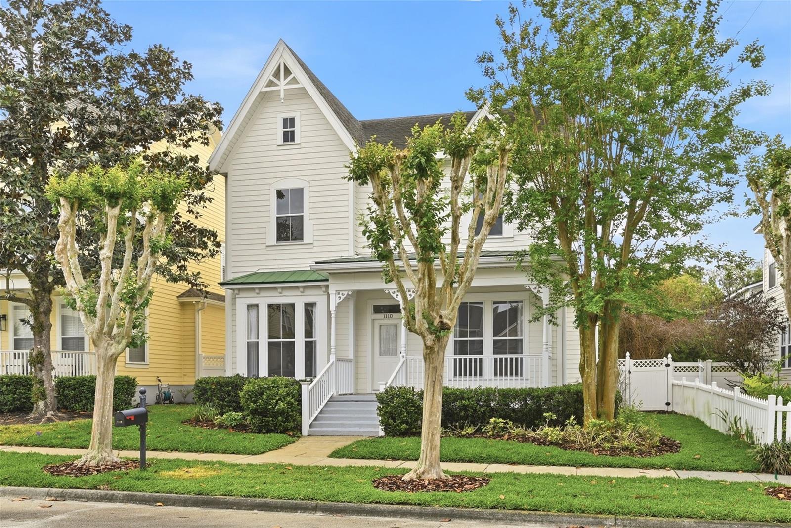 One or more photo(s) has been virtually staged. Come see this rare David Weekley Richmond Model home located in the picturesque town of Celebration, Florida. This spacious home welcomes you onto a charming front porch, built for friends, family, and neighbors to visit as they enjoy a sip of lemonade. Upon entering through the front door, you’ll find an Office/Study to the left. This room offers large windows that bring bright views of the outside porch while working from your desk. Are you a podcaster or or do you dream of being one? If so, the Office/Study includes a closet that has been outfitted with soundproof buffers. This hidden spot is the perfect place to record. Just across the hall, you’ll find a formal Dining Room. This beautifully appointed room features wainscoting and ample space for entertaining a larger crowd. The Dining Room offers direct access to the recently updated Kitchen making it easy to serve meals. This updated Kitchen spills into the Family Room. The open Kitchen Family Room combo is definitely the heart of the home. The Kitchen offers fresh white cabinetry with soft touch, closing cabinets, under cabinet lighting, a pantry, large quartz breakfast bar, and built-in Bluetooth speakers. Just beyond the bar, you’ll find the eat-in dining space. The large combination Kitchen/Family Room, is an amazing gathering spot for meals, watching a movie, or pulling a book from the built-in bookcases as you get cozy reading in front of the wood burning fireplace. The downstairs boasts an additional flex space. Use it as a 5th Bedroom, Craft Room, Exercise Room or whatever meets your needs. An elegant circular staircase is the the focal point of the home. Upstairs, is a two-story overlook. From this perch, you can view the entire living area below. In addition to the Primary Suite, there are three Bedrooms that feature over sized closets and a shared bathroom. The Laundry Room is conveniently located in between the Bedrooms. The soothing blue shade of the Primary Suite along with the many windows make it a relaxing place to unwind after a long day. The Primary Suite features a garden tub, enclosed shower, and separate vanities. There is also a walk-in closet with custom built-ins to keep your wardrobe organized. As you exit the main home, there is even more to see outside! A fenced in yard with bamboo trees provide privacy in the backyard. The brick patio is just waiting for you to light up your grill and enjoy year-round outdoor dining. Take a dip or take a few laps in the swim spa. Beyond the patio, fresh sod has been laid. Just completed, is the one Bedroom garage apartment which features its own meter and private entry. The garage apartment has vaulted ceilings, a full Kitchen with stainless steel appliances and quartz countertops. It has a separate closet outfitted with a washer/dryer hook up. This apartment would be a great In-Law Suite or it could be used as a rental property to help off-set your mortgage. An additional parking pad was thoughtfully added for the apartment tenant. The town of Celebration features a golf course, over 20 miles of walking/biking trails, Pickleball, tennis courts, and multiple pools. Residents enjoy a downtown shopping and dining experience as well as many seasonal events-Farmers Market, Car Show, Food Truck Fridays, concerts, Christmas snow. With a hospital in town, and the close proximity to OIA and Central Florida attractions, this home in the magical town that Disney built has it all!