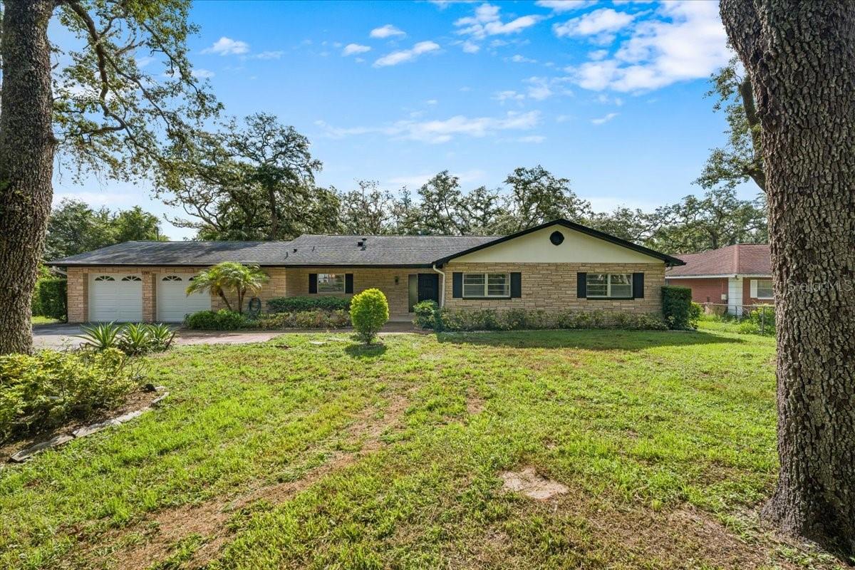 Virtually Staged. Completely renovated and move-in ready, this beautifully updated home is perfectly situated on an impressive **0.72-acre lot** in the heart of Temple Terrace, offering the ideal combination of modern updates, functional living space, and an oversized homesite rarely found in such a convenient location.

Step inside to discover nearly 2,000 square feet of thoughtfully designed living space featuring fresh updates throughout. The home boasts beautifully renovated bathrooms, stylish finishes, 4 bedrooms, and spacious living areas that are perfect for both everyday living and entertaining. A dedicated office provides the ideal work-from-home space, while the separate dining room is perfect for family gatherings and holiday meals.

The spacious kitchen flows seamlessly into the main living areas, creating a welcoming atmosphere for hosting friends and family. Three generously sized bedrooms plus an office space, provide plenty of room for everyone, while the beautifully updated bathrooms offer timeless style and modern comfort.

One of the highlights of the home is the **large screened porch**, offering the perfect place to enjoy your morning coffee, unwind in the evenings, or entertain while overlooking the expansive backyard. The **oversized two-car garage** provides abundant room for vehicles, storage, tools, or a workshop.

Outside, the **31,000+ square-foot lot** offers endless possibilities. There's plenty of room to add a pool, create the backyard oasis of your dreams, build a detached workshop, park your boat or RV, or simply enjoy the privacy and open space that properties of this size provide.

Conveniently located near USF, Moffitt Cancer Center, AdventHealth, the VA Hospital, Busch Gardens, major highways, shopping, dining, and downtown Tampa, this home combines the convenience of city living with the space and flexibility that today's buyers are searching for.

Beautifully renovated, exceptionally functional, and situated on one of the area's largest residential lots, this is a rare opportunity to own a move-in-ready home with room to grow. Schedule your private showing today!