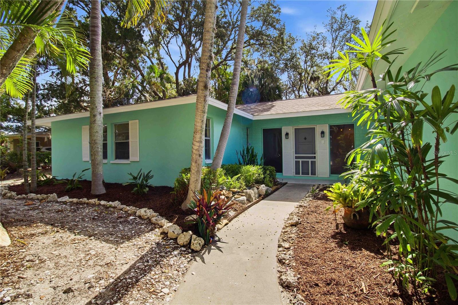 Beautifully updated block home on an oversized lot in a prime Sarasota location, directly across from Red Bug Slough Preserve. This private retreat features a large swimming pool, private fenced backyard, and lush tropical landscaping, creating a serene setting for outdoor living and entertaining. The updated kitchen offers wood cabinetry, quartz countertops, and modern finishes, while recent improvements include a new roof, septic system, fencing, and other major system updates.

Enjoy the best of both worlds with county water service for the home plus a private well for irrigation and pool use, providing added convenience and helping reduce utility costs while maintaining the property's beautiful landscaping and outdoor spaces.

No HOA, no deed restrictions, and no flood insurance required. Conveniently located near Siesta Key Beach, Downtown Sarasota, shopping, dining, medical facilities, parks, and highly rated Sarasota schools. Offering privacy, space, and flexibility, this move-in-ready property is ideal for those seeking a peaceful Florida lifestyle with room to relax, entertain, and enjoy the outdoors.