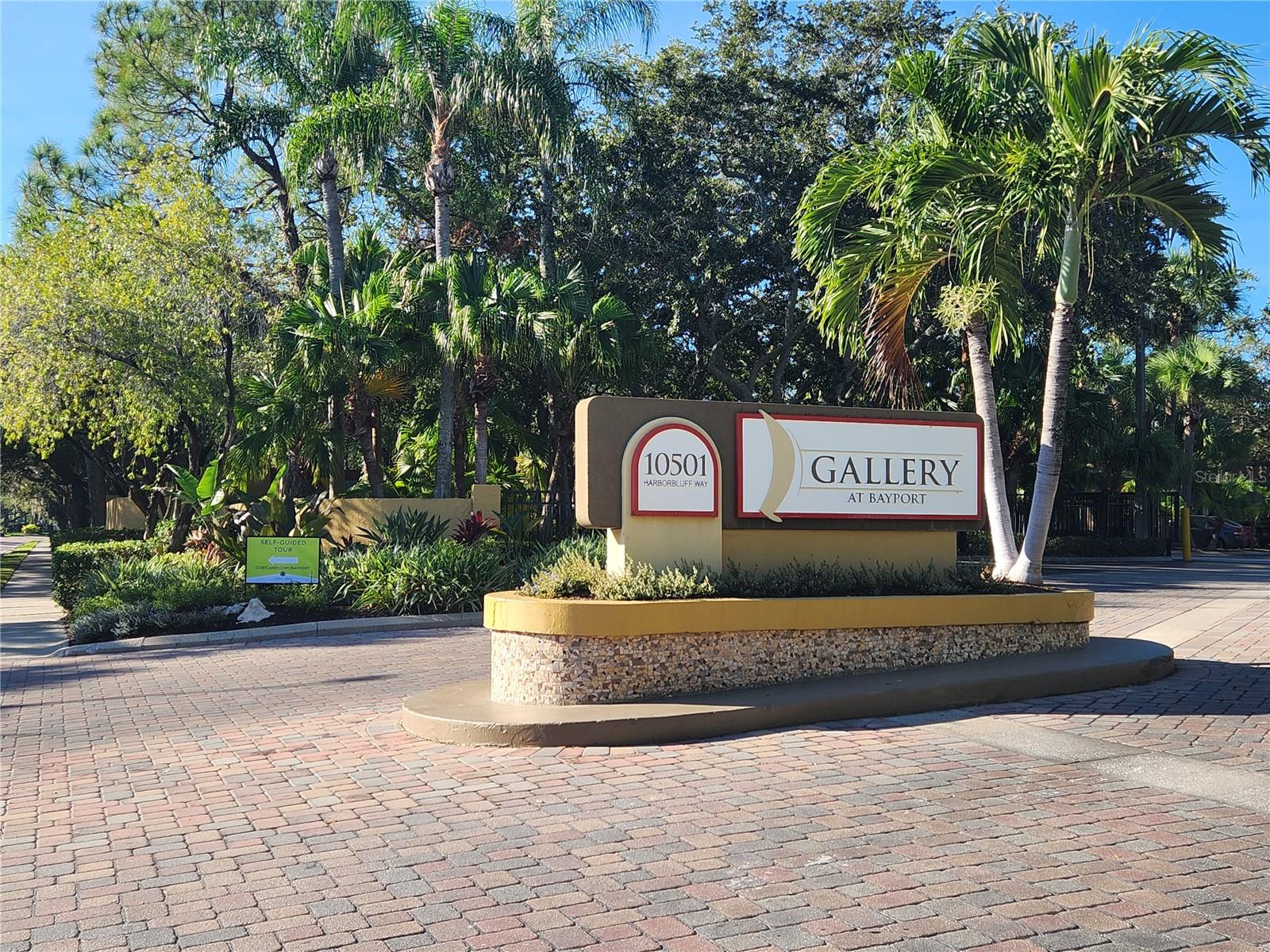 Come see this beautiful 2 bedroom 2 bathroom with a den condo in the gated community Villages of Bayport! This neighborhood will have you in awe with its resort style clubhouse featuring a lap pool, whirlpool, canal view and up to date workout room. Love nature, enjoy the beautifully landscaped community with sidewalks throughout. Minutes from all major retail stores and restaurants, this is a secret gem. Recently updated this condo will not last long! Please call Realtor to schedule showings.