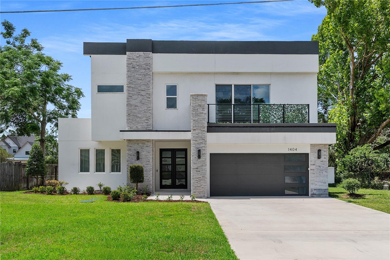 Experience the perfect blend of modern luxury, thoughtful design, and an unbeatable Winter Park location in this stunning custom residence built in 2023 by acclaimed builder Odin Homes. Showcasing over two years of gentle ownership, this exceptional home lives like new and offers a rare opportunity to own a move-in-ready custom home without the wait of new construction. Designed with sophistication and functionality in mind, this 4-bedroom, 4-bath residence features spacious living areas, designer finishes, soaring ceilings, and an open-concept floor plan ideal for both everyday living and entertaining. Every detail reflects Odin Homes' renowned craftsmanship, quality construction, and attention to detail. Perfectly situated on a beautiful homesite in one of Winter Park's most desirable neighborhoods, residents enjoy access to top-rated schools including Dommerich Elementary, Maitland Middle School, and Winter Park High School. The location offers exceptional convenience just minutes from Park Avenue's renowned dining and shopping, downtown Orlando, Winter Park Village, major employers, and area attractions. Whether you're searching for a primary residence or simply want the benefits of newer construction without the construction timeline, this exceptional custom home delivers luxury, location, and lifestyle in one of Central Florida's most sought-after communities.
