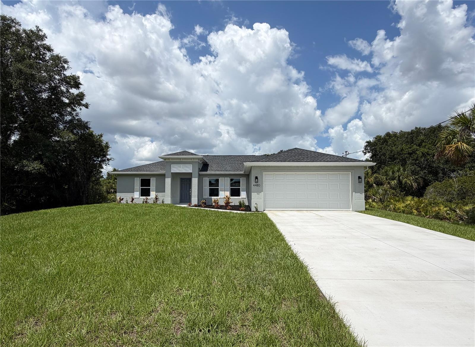BEAUTIFUL NEW CONSTRUCTION HOME on an OVERSIZED LOT - AVAILABLE NOW!

Why settle for a basic "builder grade" home when you can have it all included? This stunning home offers a level of upgrades rarely seen at this price point. Featuring an open, split floor plan with vaulted ceilings, this home is built for both style and long-term savings.

PREMIUM FEATURES INCLUDED: This home is fully equipped with PGT double-pane Hurricane Impact windows and sliding doors, meaning NO shutters are ever needed. You will find 50-year-rated porcelain tile flooring throughout the entire home, including the showers. The chef-inspired kitchen features 36-inch upper cabinets with soft-close drawers and doors, premium granite or quartz countertops, and quality stainless steel appliances.

BUILT FOR SAVINGS AND DURABILITY: Designed to keep your insurance, maintenance, and utility costs at a minimum, this home includes an energy-efficient HVAC system, a 3- or 4-zone sprinkler system and a 30-year shingle roof. The exterior comes fully sodded and professionally landscaped, complete with gutters around the entire perimeter and a fully screened-in lanai for year-round Florida living.

PEACE OF MIND: Move in with confidence knowing your investment is protected by extensive warranties, including a 10-year structural warranty and a 10-year HVAC warranty.

FINANCING BONUS: Our preferred lender is currently offering up to $1,500 in closing cost assistance!