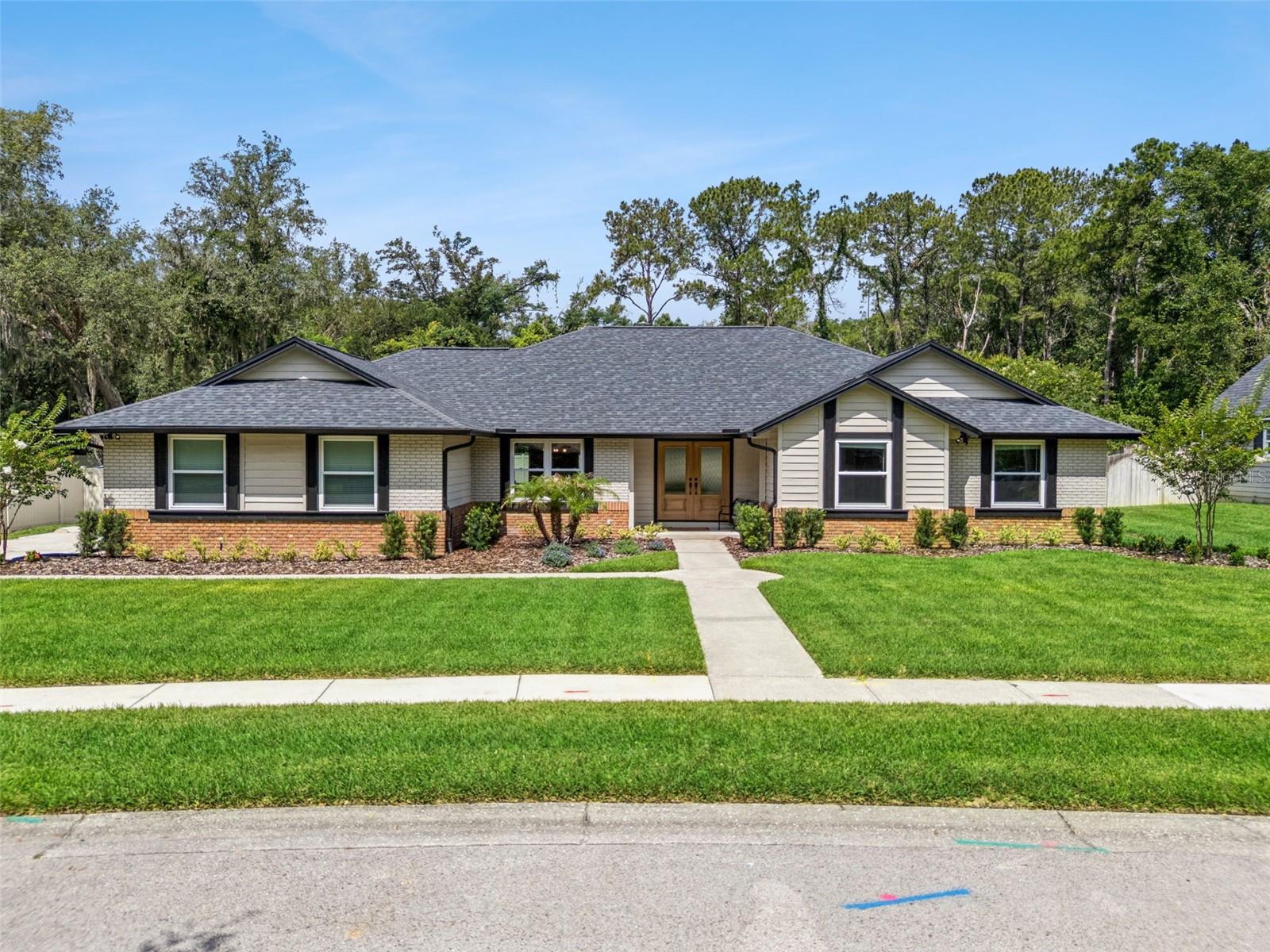 Absolutely stunning, fully updated 3-bedroom, 2.5-bath pool home located in the highly sought-after Northridge community of Longwood! Located on a quiet cul-de-sac, you're going to love everything this home has to offer. From the moment you enter, you'll be impressed by the abundance of natural light, beautiful hardwood floors, and soaring cathedral ceilings that create an inviting and spacious atmosphere. The heart of the home is the beautifully remodeled kitchen, featuring granite countertops, custom cabinetry, stylish tile backsplash, a large center island, newer stainless steel appliances, and a picturesque window overlooking the sparkling pool. The adjacent family room boasts cathedral ceilings, a cozy wood-burning fireplace, and expansive views of the backyard oasis.
The spacious primary suite with walk in closet, offers a beautifully updated en-suite bathroom with dual vanities, a bidet and walk in shower. The private office with entrance to the primary bedroom could easily serve as a nursery, sitting room, or flex space. Bedrooms two and three are conveniently located near the updated secondary bathroom. An interior laundry room and half bath with direct pool access add functionality and convenience. Designed for year-round Florida living, the fully fenced backyard is an entertainer's dream, featuring a large refinished pool, ample space for grilling, gatherings, and outdoor relaxation with no rear neighbors. The community amenities include a playground, pickle ball, tennis, and basketball courts. This is truly Florida living at it's finest! Major updates provide peace of mind, including: Roof (2022), Windows & Doors (2022), Gutters (2022), HVAC (2023), Exterior Paint (2023), Vinyl Fence (2023), Kitchen Appliances (2024), Water Heater (2021), Pool Refinish (2017), Pool Pump (2025), and Pool Deck Paint (2026).