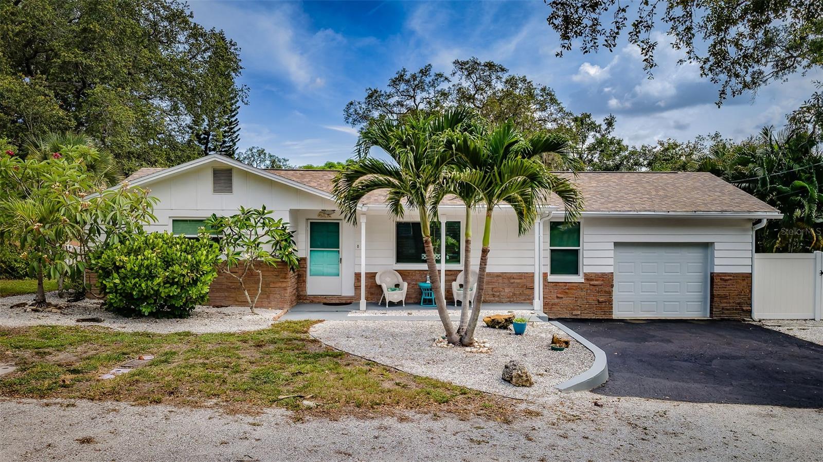 412 PENNSYLVANIA AVE in CRYSTAL BEACH! Welcome to this charming coastal cottage at 412 Pennsylvania Avenue, nestled in the eclectic and historic waterfront community of Crystal Beach. Situated in a desirable high-and-dry X flood zone, this property offers peace of mind along with the relaxed Florida lifestyle you've been searching for.

Just a few blocks from the waterfront park and fishing pier, you'll enjoy breathtaking Gulf sunsets and easy access to the community's scenic shoreline. The entrance to the Pinellas Trail is conveniently located at the end of Pennsylvania Avenue, and golf carts are welcome throughout the neighborhood, making it easy to explore all that Crystal Beach has to offer.

Positioned on two lots with alley access, this inviting 2-bedroom, 2-bathroom home features an open-concept floor plan and a spacious, fully fenced backyard with plenty of room for pets, play, entertaining, or future possibilities. The oversized one-car garage includes a washer and dryer, additional storage space, and a second full bathroom.

With no deed restrictions, you'll appreciate the flexibility and ample space to park boats, RVs, golf carts, and other recreational vehicles right on your property. The Sutherland Bayou public boat ramp is only minutes away, providing quick access to the Gulf and surrounding waterways.

Inside, the home is move-in ready with easy-care tile flooring throughout, an updated bathroom featuring a walk-in shower with glass enclosure, and numerous recent improvements, including new windows and doors installed in 2025 and 2026, an A/C system replaced in 2023, and a roof installed in 2016.

Operated as a successful Airbnb, this property offers excellent income-producing potential. Most furnishings are negotiable, making this an attractive turnkey opportunity for investors or seasonal residents.

Ideally located near the area's most beautiful beaches, including Honeymoon Island, Caladesi Island, Clearwater Beach, and Fred Howard Park Beach, and just 10 minutes from the vibrant downtown districts of Dunedin and Tarpon Springs.

Come experience the unique charm, friendly atmosphere, and coastal beauty of Crystal Beach. As the locals say, "If you're lucky enough to live in Crystal Beach, you're lucky enough."