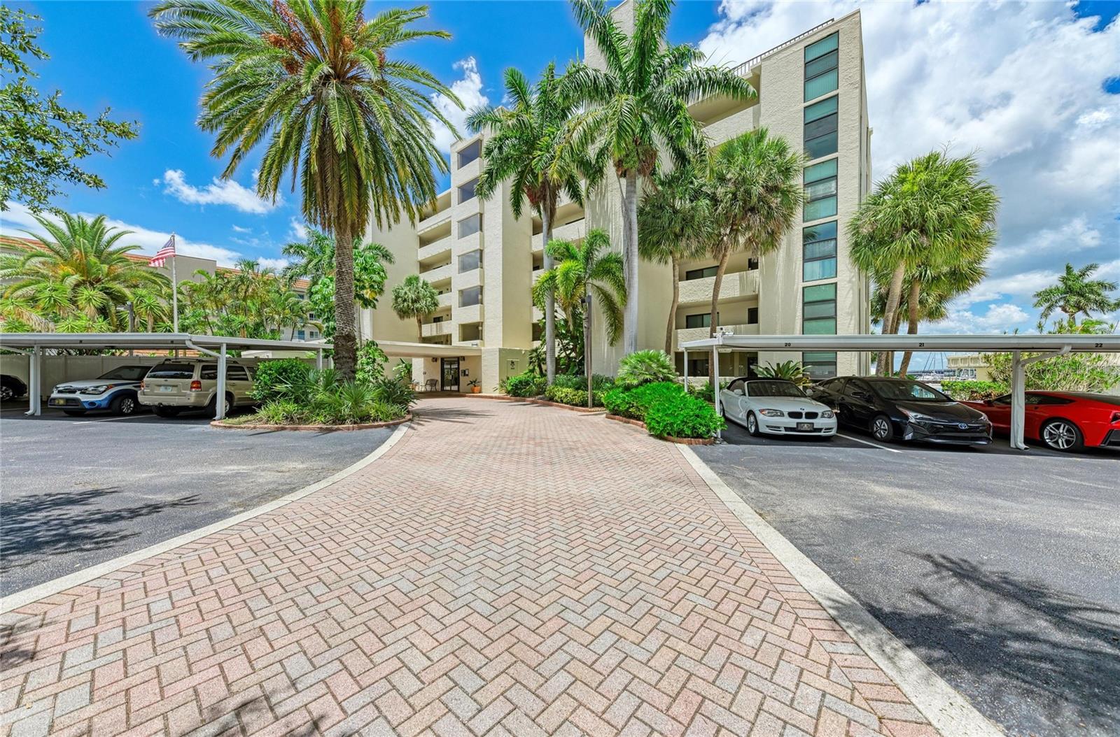One of the best views in all of downtown Bradenton. Step off the elevator on the 5th floor and into paradise—you'll feel like you're on a cruise ship. This beautifully updated 2BR/2BA condo overlooks the saltwater Manatee River, where dolphins and manatees glide by as you sip coffee from your screened lanai. Nearly everything is brand new, with tile flooring throughout and hurricane-impact windows. Both the master and living room enjoy spectacular, unobstructed river views—light, airy, and perfect for entertaining. This intimate community of just 33 units allows one small pet and offers a private beach, pool, hot tub, and clubroom with sauna, kitchen, and pool table. The building borders the Riverwalk, downtown Bradenton's waterfront path for strolling, exercise, or fun, just blocks from restaurants and bars. Downtown living at its finest—and with the engineering milestone already passed, this is one of the best buys on the Manatee River.