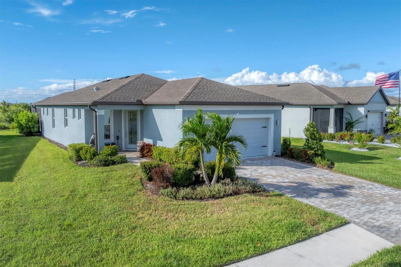This home is truly move-in ready and looking for its new owners! Designed for fun and entertaining, this Contour floorplan with two bedrooms, two baths and a den is in the highly active Del Webb Bay View 55+ community. The AIR-CONDITIONED 2 car garage could be a delightful hobby spot or a place to work on your favorite toy. Out back, an oasis with tropical landscaping- the extended screen lanai with SURROUND SOUND plus a paver patio with big sky and conservation views. Bay View residents enjoy streaming TV and internet through the HOA, full grounds maintenance, a modern fitness center, resort-style pool with cabanas and hot tub, shuffleboard, community garden, two dog parks, an on-site restaurant, golf cart-friendly paths, and endless clubs and activities for active adults. Located 1.5 miles from I-75 and 275, airport, shopping and dining are a short distance away. 2025 taxes include the CDD fee