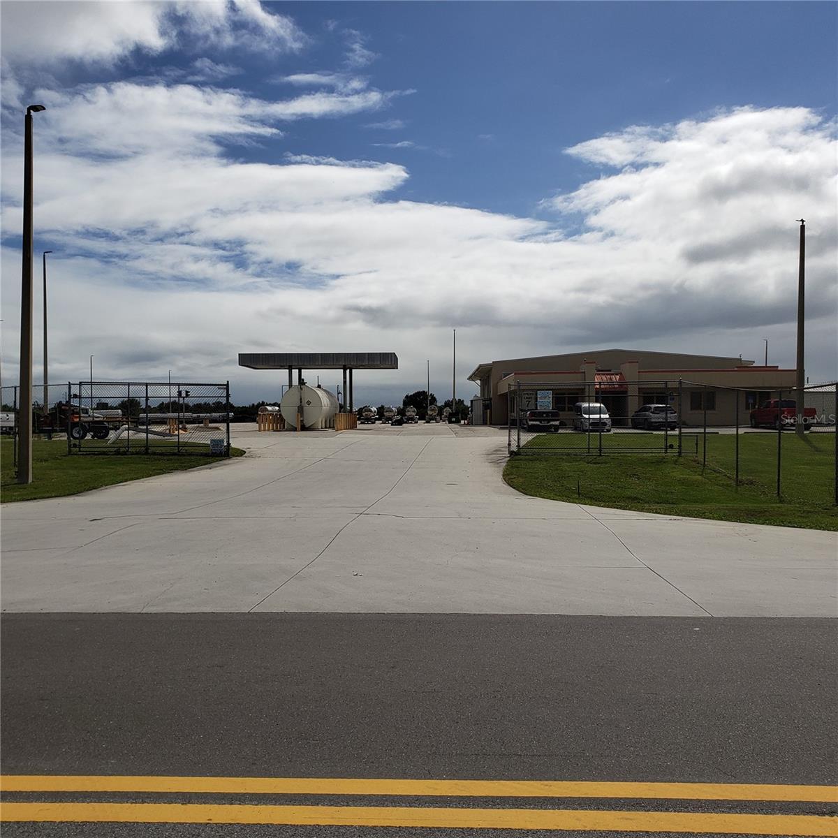 Location is east of Okeechobee city at the intersection of Hwy 710 and SR 15 B and Martin Highway (MCR 714)
Included with property:
5.7 acres of commercial concrete truck parking area 33 acres total
There is a standby diesel powered generator that runs the entire facility at full capacity.
There's been a $10000 update on the lighting system.
The fuel island has 2 new 35 gpm pumps and a 10000 gallon double walled fuel storage tank which are current with all inspections.
The certified scales are in working order.
Located in Okeechobee county OPPORTUNITY ZONE.
There is a fenced parking area with roll back gates.
All furniture and fixtures remain with the property.
Refrigeration and a/c are maintained by Trac Air and are serviced regularly.
Present zoning is Agriculture with a special exception for truck terminal.  Special exception is transferable with the property.
THIS IS A TURN KEY OPERATION
