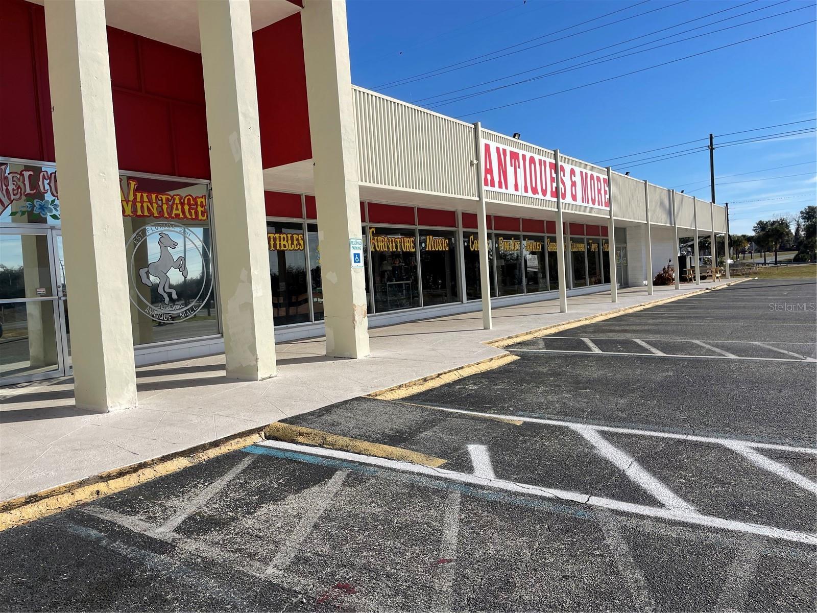 Exceptional visibility and tactical positioning define this premier commercial asset strategically located at the primary commercial nexus of U.S. Highway 441 and State Road 19 in Eustis, Florida. Offering a commanding presence within a high-growth Lake County retail corridor, this 28,081-square-foot facility provides a highly adaptable footprint designed to accommodate a singular anchor tenant or multiple users, with flexible demising options available down to 11,770 square feet. The property benefits from extraordinary traffic exposure, capturing a combined volume of over 66,000 vehicles per day at one of the region's busiest intersections, and is currently anchored by a highly successful regional tenant that drives consistent consumer traffic.The building infrastructure is engineered for institutional standards and high-volume operations, featuring a fully climate-controlled interior, a comprehensive fire suppression sprinkler system, a robust 800-amp electrical service, and two 10' x 12' grade-level roll-up doors that ensure seamless logistics and inventory management. Dedicated customer and staff parking includes 61 paved surface spaces with excellent ingress and egress points, a high-visibility marquee pylon sign directly facing the highway corridor, and full ADA accessibility compliance. Whether positioning for a premium retail showroom, multi-tenant marketplace, or adaptive commercial use, this landmark property presents a rare and versatile acquisition or leasing opportunity for discerning investors and corporate operators seeking market dominance. Available for sale or for lease.