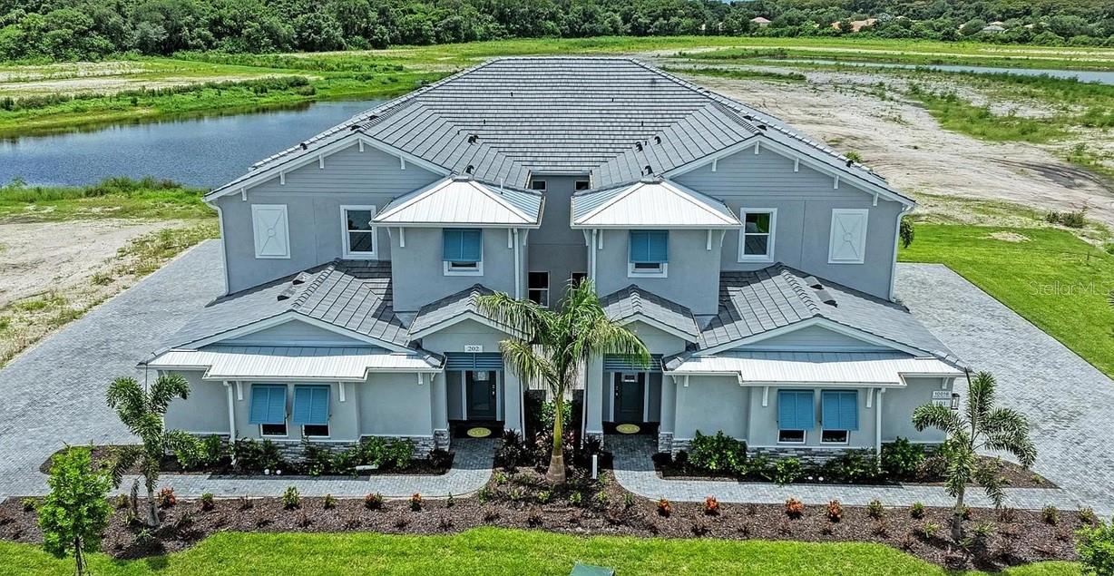 This furnished, upper level Naples Floor Plan Coach Home unit features 3 bedrooms, 2 full baths and a 2 car garage off the the lower level. The main suite features a spacious bedroom, walk-in closet, private bath, and a sitting area with access to the balcony that is perfect for relaxing with a book or a beverage. The main living area boasts an open concept with a large kitchen that flows perfectly into the living and dining area making entertaining a breeze. Tucked away towards the back of the home, you will find 2 additional bedrooms with ample closet space and another full bath. Additionally, this home features a loft, which can be used as a home office or movie room. Cable and internet are included. This is a vibrant, maintenance-assisted community with a resort style pool, outdoor kitchen and fitness center for your enjoyment. No smoking allowed. Security deposit, background and credit check are required. CALL NOW FOR YOUR PRIVATE TOUR.