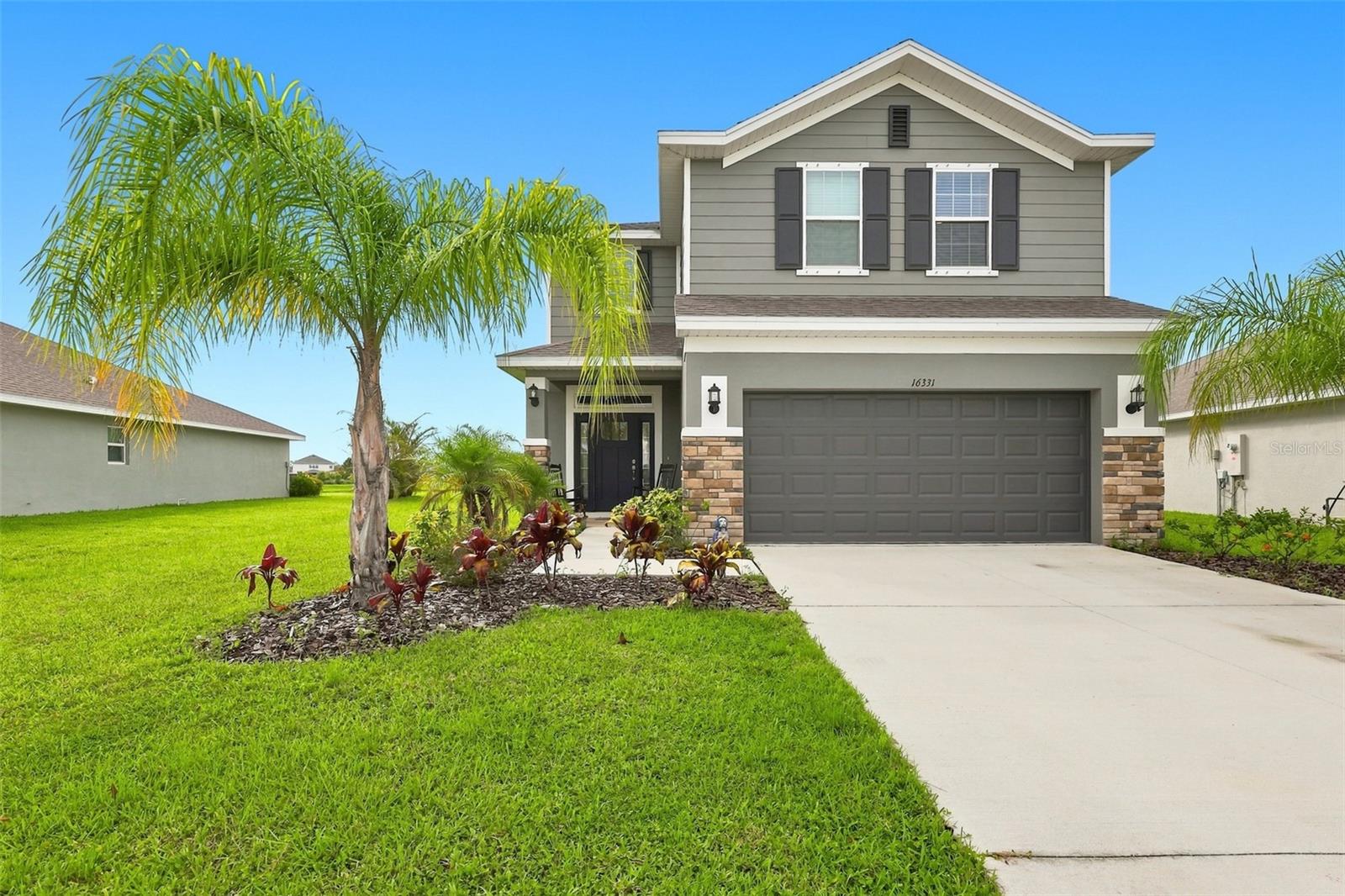 Welcome to this beautifully built 2025 home offering 4 spacious bedrooms, 2 full bathrooms, and a convenient half bath. This two-story residence features an open-concept floor plan with expansive living and dining areas, perfectly centered around a well-appointed kitchen that's ideal for entertaining family and friends.

Thoughtful upgrades include a fully fenced backyard, a screened lanai, and upgraded lighting and ceiling fans throughout. Upstairs, you'll find all four bedrooms, including a generous primary suite with peaceful pond views, a large walk-in closet, and an elegant en-suite bathroom featuring dual vanities. Three additional bedrooms are thoughtfully positioned for privacy, along with a versatile loft/flex space that's perfect as a media room, home office, playroom, or additional living area.

Step outside to the screened lanai overlooking the tranquil pond and enjoy the spacious, fully fenced backyard with plenty of room for pets, play, gardening, or weekend barbecues.

Residents also enjoy outstanding community amenities just a short walk away, including a large resort-style swimming pool, clubhouse, playground, tennis courts, and more. This move-in-ready home combines modern style, functional living, and exceptional community amenities—don't miss the opportunity to make it yours!