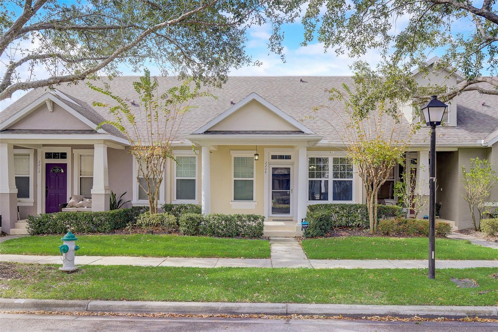 Don't miss your opportunity to discover this exquisite 3-bedroom, 3-bathroom townhome with a 2-car rear entry garage in the coveted Avalon Park community! Upon entering, the first floor reveals an open floor plan of the living room and dining area that flows into the kitchen. Off the living room is a generous master bedroom with a luxurious ensuite. This ensuite boasts dual sinks and an elegant glass-enclosed shower and closet. The first floor also hosts the second bedroom and a well-appointed bathroom for your convenience. Venturing to the second floor, you'll encounter the third bedroom with its own ensuite, offering privacy and versatility. This meticulously maintained home features striking tile floors, granite countertops, and the stainless steel appliances in the kitchen add a modern touch to this charming residence. The laundry closet is conveniently located inside next to the kitchen. You'll also appreciate the covered, screened-in back porch, which leads to the 2-car garage. This residence is a true gem, ready to welcome its new owners. Families will appreciate the proximity to top-rated schools and a plethora of community events held throughout the year. Travel and commute are a breeze with convenient access to downtown Orlando, Lake Nona/Medical City, Orlando International Airport, and the Brightline train, which connects you effortlessly to South Florida. Plus, the pristine shores of Florida's east coast beaches are just a short drive away. Additional features include 2020 water heater, front and rear rain gutters, newer garage door and new double-pane windows. Schedule a viewing today and imagine the possibilities!