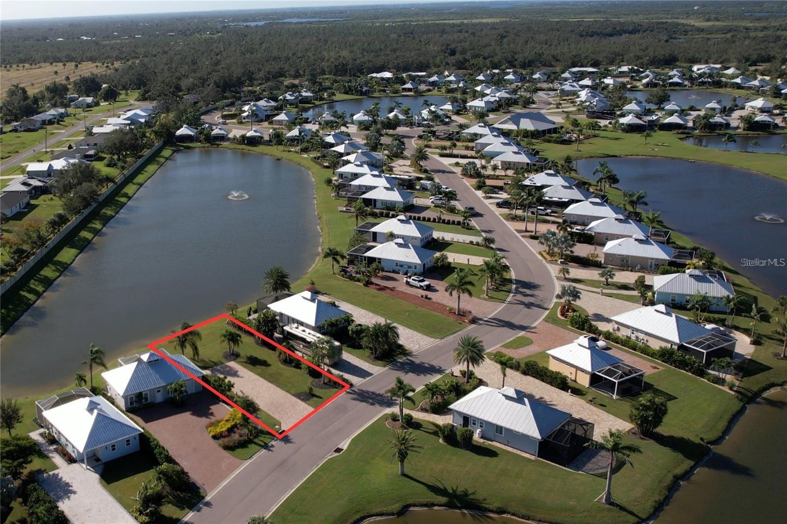 Lot 4 – Create your dream Florida motorcoach retreat on Lot 4 in the highly sought-after Thornton Creek Motorcoach Resort, where breathtaking DOUBLE WATER VIEWS and exceptional privacy make this property truly special. Perfectly positioned, this premium lot enjoys unobstructed lake views from both the front and rear, with no neighbors directly across or behind—just peaceful water vistas, mature palms, and lush tropical landscaping.
The property features a spacious pull-in paver pad with a 50-amp pedestal, offering generous space for even the largest Class A motorcoach, plus additional room for a vehicle or golf cart. Whether you’re ready to enjoy the lot immediately as a luxurious coach site or envision expanding it into a private retreat, the possibilities are wide open.
Owners have the flexibility to build a casita up to 1,000 square feet, and with no required build timeline, you can design and create your ideal space whenever the time is right.
With only a limited number of undeveloped lots remaining in this exclusive gated Class A motorcoach resort, opportunities like this are becoming increasingly rare. Lot 4 offers a unique chance to secure your own slice of paradise and create a personalized escape in one of the area’s most desirable RV communities.
Schedule your private tour today and start imagining the luxury resort lifestyle that awaits.