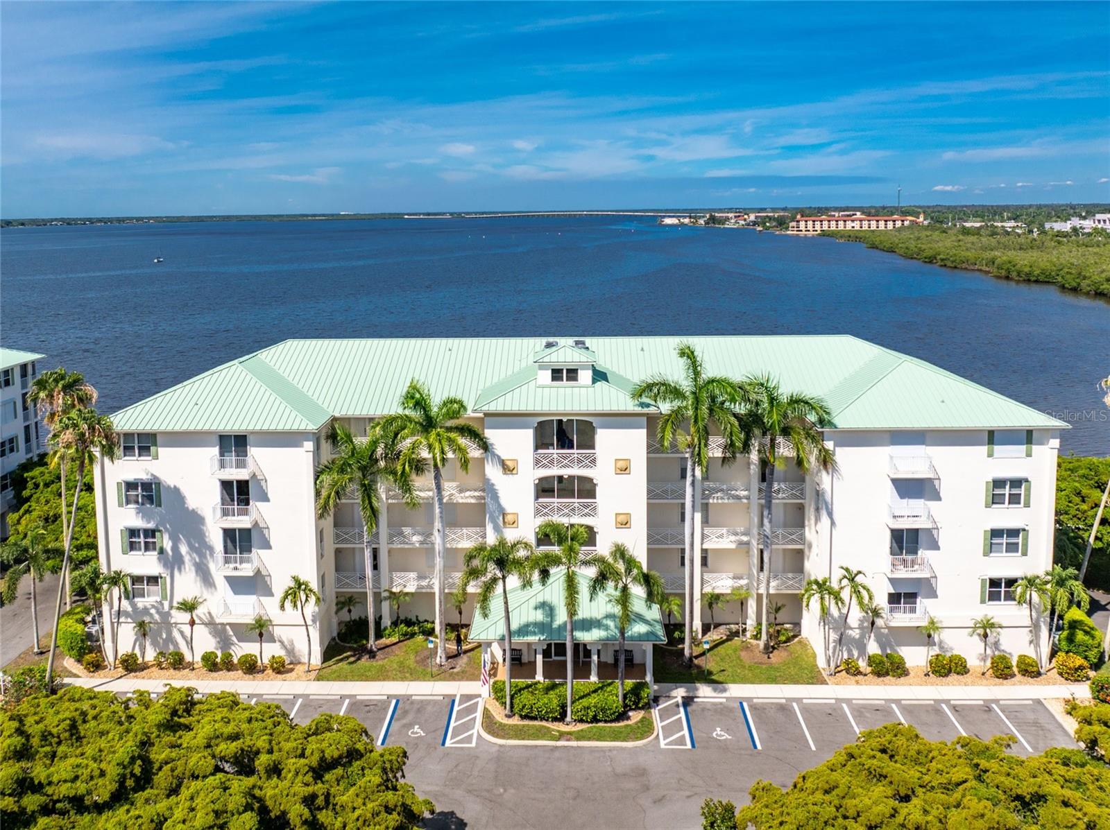 *Location Location location! Wake up to Amazing Sunrises and end your day with Spectacular Sunsets over Charlotte Harbor from this beautifully maintained Harbor Walk condominium. Enjoy Million-dollar Water Views while watching dolphins, manatees, and native birds play right in your backyard!

Perfectly positioned along the Harbor Walk Trail, this residence places you just steps from Everything that makes Downtown Punta Gorda so special. Take a short stroll to Laishley Park, The Marina, Waterfront Dining, Boutique Shopping, Entertainment, Post office, and the Charming streets of Historic Downtown. Walk or bike for miles along the Harbor and enjoy the Florida Lifestyle you’ve been dreaming about!

Inside, you’ll find a thoughtfully designed 3-bedroom, 2-bath floor plan featuring Plantation Shutters, Crown Molding, a Formal Dining area, and Abundant Storage throughout. The kitchen is beautifully appointed with Granite Countertops, Solid Wood Cabinetry, and Convenient Deep Pull-out Drawers.

Harbor Walk offers exceptional amenities including a Heated Saltwater Pool, Private Tennis Court, High Speed Internet, Healthy Reserves, Secured Building Entry, Assigned Parking Space, Hurricane Shutters, and a Private Ground-floor Storage room for all your beach, bike, and boating gear.

Whether you’re searching for a year-round residence or seasonal retreat, this waterfront gem combines breathtaking views, outstanding amenities, and an unbeatable location in one of Punta Gorda’s most desirable communities.

Million-dollar views. Spectacular sunsets. Downtown at your doorstep. This is Harbor Walk living at its finest.