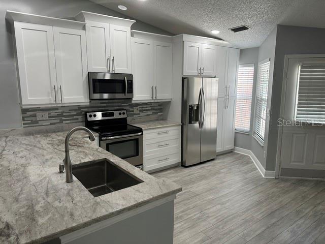 VILLAS OF BEACON GROVES - Residential Lease