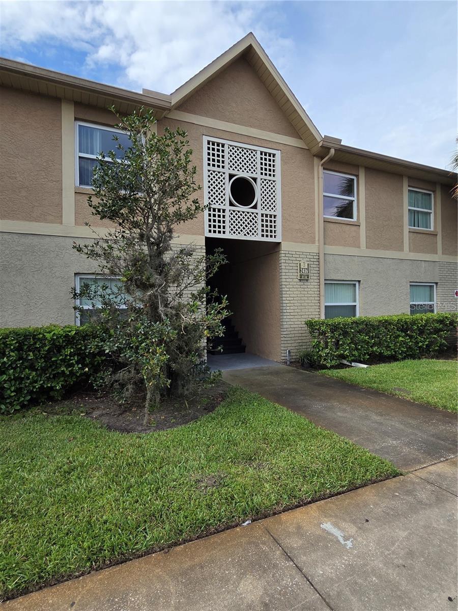 This is the perfect unit for investor or to live in. Income producing. Property  is rented. Second floor unit ready for you! Condo with 2 bed and 2 baths. This unit features throughout ceramic flooring. Spacious kitchen with open view of the dining area. Screened patio. Enjoy Living at Hawthorne Village. Centrally located. Minutes to everything: Schools, Airport, Turnpike, major highways, Disney, Sea World, Universal Studios and major Theme Park, Attractions and shopping areas. The community has many amenities to enjoy, Community Pool, Clubhouse, Fitness Center, Tennis Courts, Basketball Court and Playgrounds.