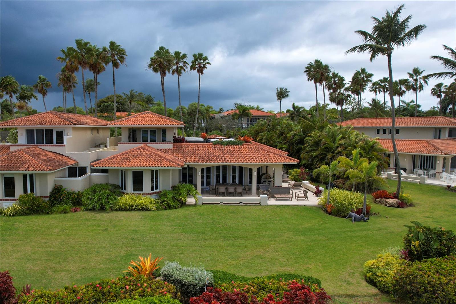 Beautiful villa for sale located in The Greens Villa within the Dorado Beach Resort. This elegant property features 4 spacious bedrooms and 4.5 bathrooms, offering comfort, privacy, and ample space for residents and guests.

The home offers approximately 4,000 square feet of interior living space, complemented by an impressive 2,100 square feet of covered terraces designed for outdoor living and entertaining. These terraces provide panoramic views of the golf course and the lake, creating a serene and picturesque setting. The property also includes a 600-square-foot garage with space for up to 4 vehicles.

This villa is professionally decorated and will be sold fully furnished, allowing the new owner to move in and immediately enjoy the refined lifestyle the community offers. The home also features central air conditioning throughout and a private jacuzzi, perfect for relaxation.

Ideally situated near to the beach, the property enjoys beautiful lake and golf course views, combining luxury, comfort, and the natural beauty of Dorado Beach Resort. This is a rare opportunity to own a stunning residence in one of Puerto Rico’s most exclusive resort communities.