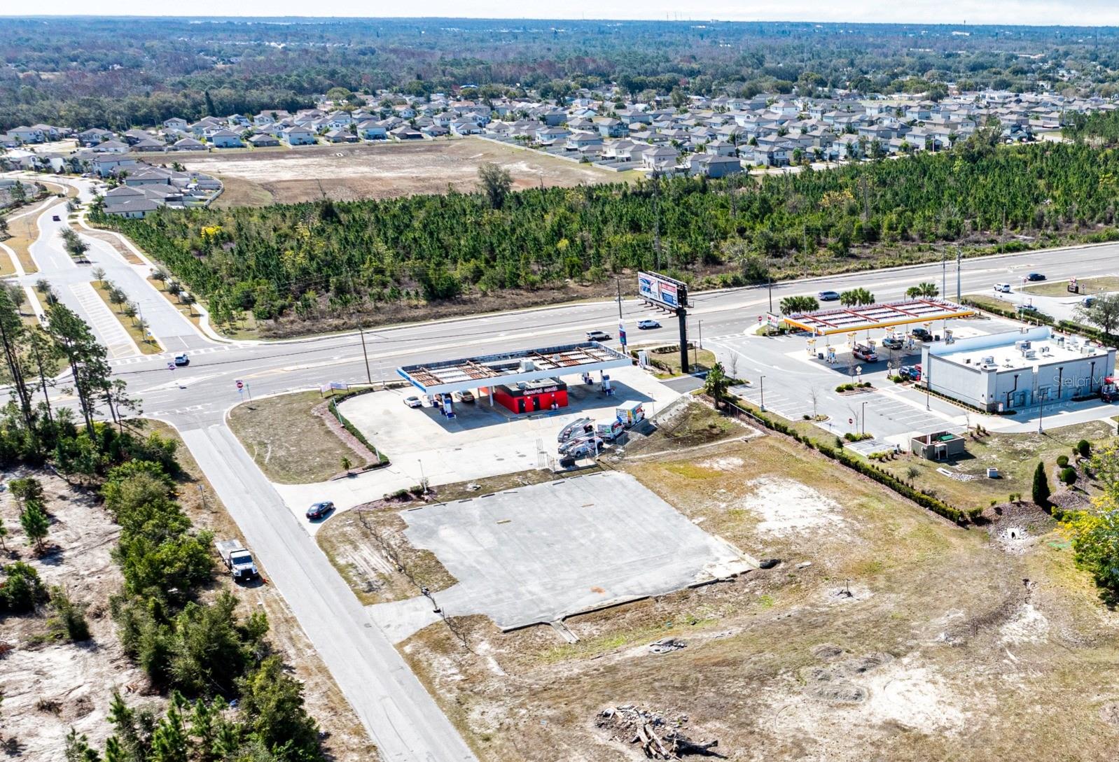 Prime Commercial Opportunity. This ¾-acre property, formerly a medical office, offers a pre-existing parking lot and versatile potential for a variety of commercial businesses. Conveniently located just off US Hwy 54, this central location provides excellent accessibility and visibility. Take advantage of this ready-to-develop site for your next business venture!