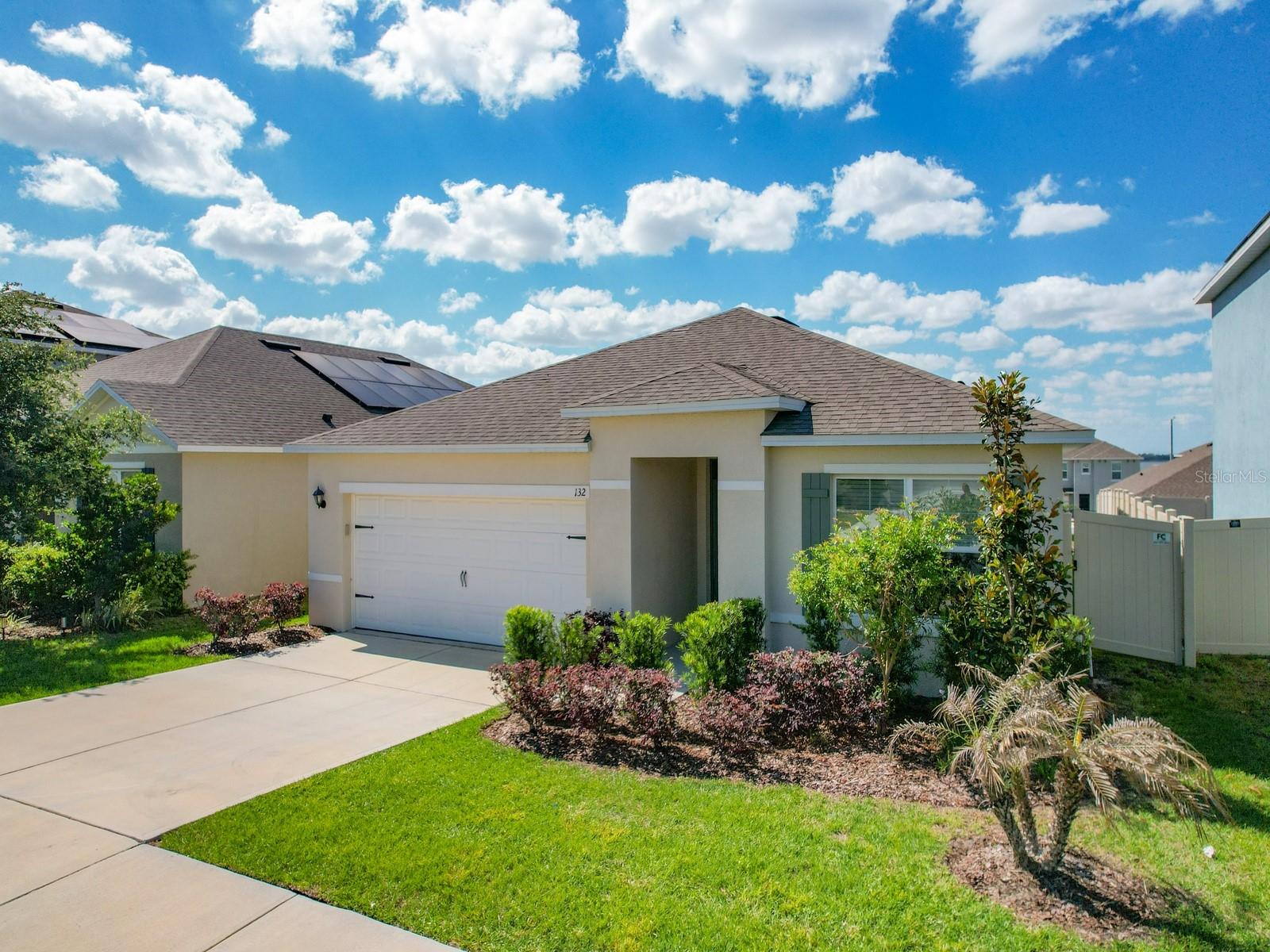 Fresh $5,000 price improvement — creating even more value in Eden Hills from day one! Fully Fenced. Move-in ready - no waiting! Low $143 a year HOA. Unbeatable value in Eden Hills! One of the few homes in the community with a fully fenced yard — ideal for pets, entertaining, or simply enjoying your backyard on your own terms. Inside, an open layout with ceiling fans throughout keeps things bright and comfortable year-round, with owner-upgraded vinyl flooring that’s already done for you.  Beyond your front door, Eden Hills offers a resort-style pool and cabana, walking trails, parks, two playgrounds, a pedestrian dock with lake access, and a dog park. Centrally located between Orlando and Tampa, you’re minutes from major routes, shopping, dining, and everything Central Florida. If you’ve been losing out on homes that need work, need time, or need more than you budgeted — Schedule your showing today!