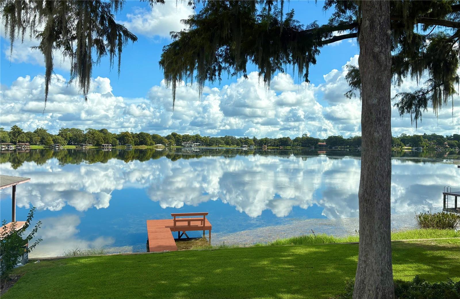 A truly rare offering on the shores of Lake Sue, this exceptional waterfront homesite presents a unique opportunity in one of Orlando's most treasured neighborhoods. Nestled within the highly sought-after Rose Isle community, the setting enjoys frontage on scenic Lake Sue, where sparkling water views, majestic oak trees, and an unparalleled backdrop inspire something truly extraordinary.

Offered for the first time since it was originally built in 1958, this generational holding has been cherished by the same family for decades. The expansive lot provides a remarkable canvas for creating a custom lakefront estate while enjoying one of Central Florida's most desirable addresses.
The location is equally compelling. Just down the street from the neighborhood entrance to Mead Botanical Garden, residents enjoy convenient access to 48 acres of walking trails, boardwalks, gardens, outdoor performances, and year-round community events. Just minutes away, Harry P. Leu Gardens provides another beloved destination with beautifully curated botanical gardens, shaded walking paths, tranquil lakeside scenery, and the historic Leu House Museum. Completing the appeal is exceptional accessibility to Downtown Orlando, Winter Park's famed Park Avenue, premier hospitals, the Orlando Science Center, museums, acclaimed dining, and a wide variety of entertainment.

Priced to reflect only land value, this offering presents a rare chance to reimagine one of Rose Isle's most coveted waterfront locations. With its generous homesite, sought-after setting, and rich history, this is a once-in-a-generation opportunity to create a legacy estate that can be enjoyed for years to come.