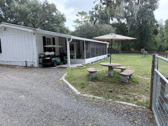 **Paradise Awaits** This amazing home is nestled on a huge .39 acre private lot in the heart of Dunnellon.. The property is close to the beautiful Withlacoochee River and Lake system with private access and boat ramp for residence of this community.. This home has been totally renovated from. top to bottom in 2022.. New Roof, new floors, new bathrooms, new A/C, new kitchen, new water softner system, new paint new plumbing and electrical upgrades.. There is a storage contain er fitted with doors and windows the yard is fenced in and very private with beautiful oak trees throughout the community. The home is close to the Gulf of America and and only minutes to the rainbow river.. Don't let this Golden opportunity pass you by call now...