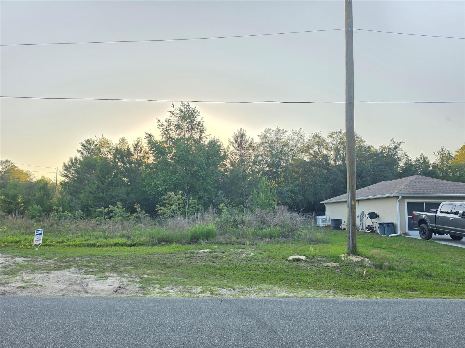 Build your dream home or secure your next investment opportunity in the fast-growing community of Marion Oaks! This lot features city water available, paved road access, and power available, making development simple and cost-effective. Plus, the property is free of environmental concerns, helping save time and reducing additional building expenses. This prime homesite is ideally located in southwest Ocala, one of Marion County’s most desirable and expanding residential areas, with convenient access to major roadways, including I-75 and CR-484, for an easy commute to downtown Ocala, Belleview, and surrounding Central Florida destinations. Enjoy being just minutes from shopping, dining, medical facilities, schools, parks, and the popular Marion Oaks Community Center, offering everyday convenience in a peaceful neighborhood setting. Marion Oaks continues to see strong growth and infrastructure improvements, including expanded utility services throughout the area.