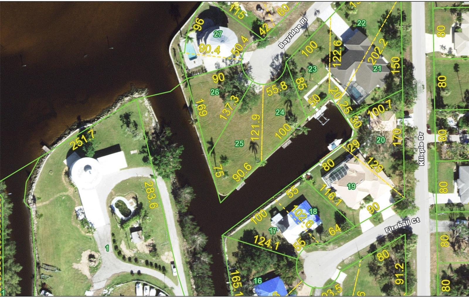 THREE (3) WATERFRONT ADJACENT LOTS (2 parcels) WITH GULF ACCESS! Lots 24,25,26. Just over a HALF ACRE (0.52 acres) in the cul-de-sac of a quiet dead end street. 434 FEET of waterfront with concrete seawall. Situated on canals with immediate out to Charlotte Harbor. Great HARBOR VIEW from lot 26. Sailboat access is possible since the height of the US 41 Barron Collier bridge and the Gilchrist Bridge is 45 FEET. Beautiful neighborhood with oak trees and mature palm trees. This property is just a little over a mile from historic downtown Punta Gorda shopping, dining, medical care, waterfront parks, boat ramps, fishing piers, walking and biking paths, art galleries, Fishermen's Village, weekend farmers markets, events and more! This is a fantastic waterfront property to build your Florida dream home in a great location!