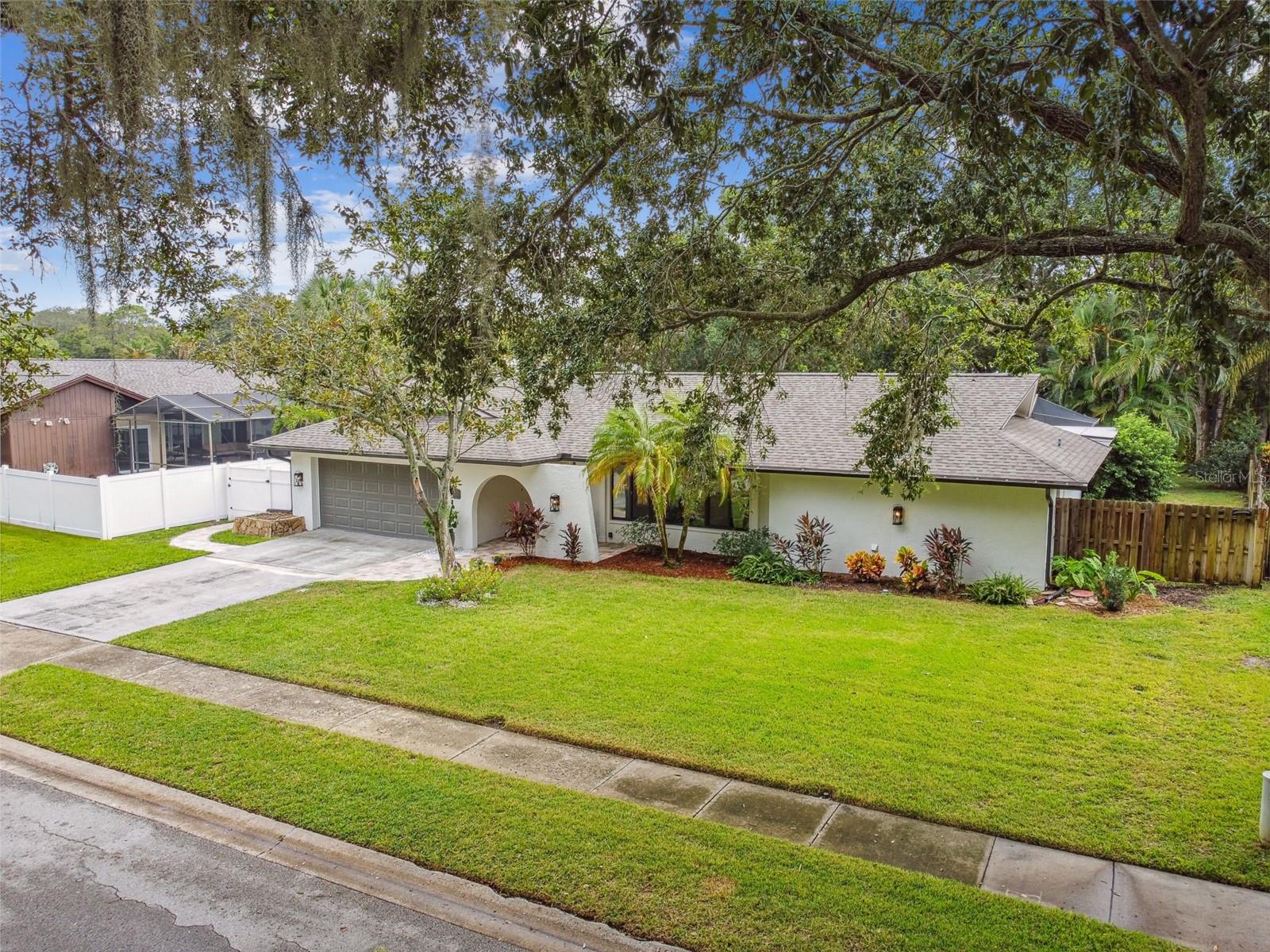 This breathtaking home is a must see! The updating in this home is extensive. From the outside you will notice the new 2022 roof and new hurricane windows and beautiful paved walkway. Entering this immaculate home, you will be welcomed with gorgeous new porcelain wood plank flooring which is run throughout most of the home and bedrooms. The brand new kitchen is expansive with new appliances, marble countertops, beautiful finishes and an extra service nook.  Some other features include: renovated master bathroom (2023), split AC in garage (2023), hurricane windows and doors throughout, UV filter system for HVAC (2023), new insulation blown in attic to reduce electric bill, 7-inch super gutters (2023), newly painted exterior, new hurricane garage door, SALT POOL conversion (2022), new cabinets and countertops added to laundry room, generator hookup, wood-burning fireplace, large living spaces, and so many more touches.  This home is 1/2 mile to Pinellas Trail. Golf cart community. Schedule your appointment today!
All information to be verified by agent and buyer