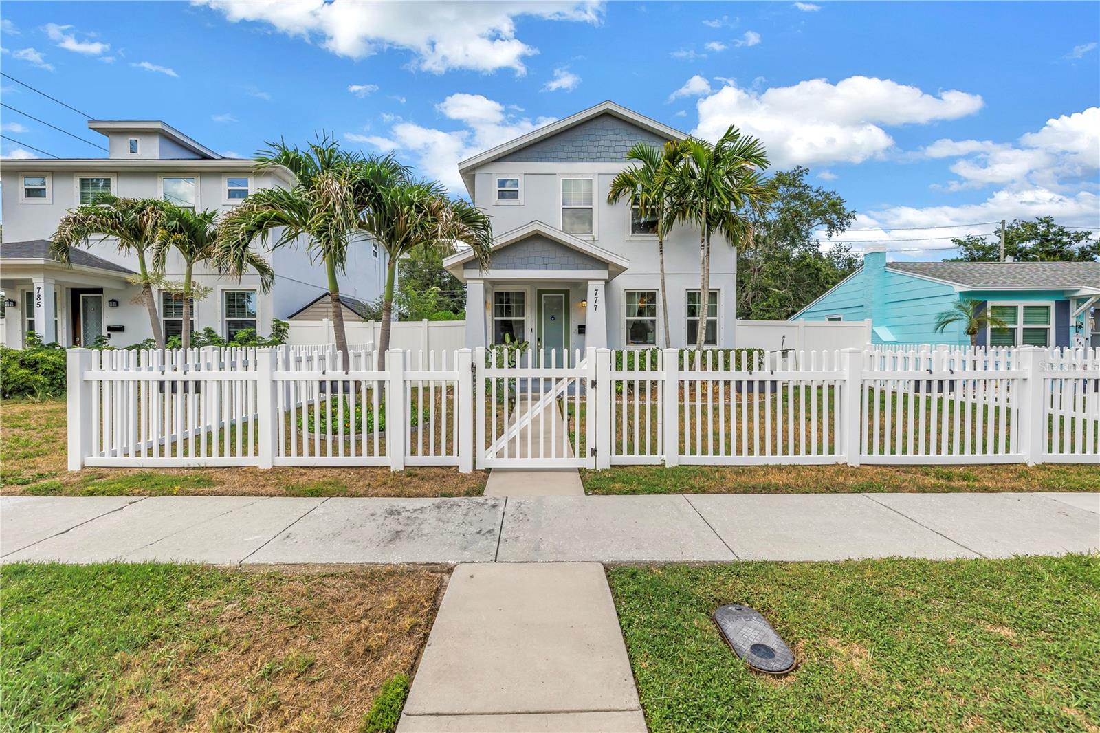 Built in 2019, this impeccably maintained home offers everything today's buyers are looking for—modern construction, a resort-style saltwater pool, a non-flood zone location, no HOA, and private alley-access parking—all in the highly sought-after Allendale Oaks neighborhood. From the moment you arrive, the lush tropical landscaping and charming fenced front yard create exceptional curb appeal. Inside, the bright open-concept floor plan features soaring ceilings, elegant crown molding, and wood-look ceramic tile flooring throughout the main living areas. The spacious living, dining, and kitchen spaces flow effortlessly together, creating an ideal layout for both everyday living and entertaining. The beautifully appointed kitchen is the heart of the home, featuring quartzite countertops, stainless steel appliances, soft-close cabinetry, a classic subway tile backsplash, a large center island, and a walk-in pantry. Also on the first floor is a dedicated office that can serve as a fourth bedroom, guest room, playroom, or private workspace. Upstairs, the spacious primary suite offers a relaxing retreat with a large walk-in closet and a luxurious ensuite bath complete with dual vanities, a glass-enclosed walk-in shower, designer tile finishes, and a private water closet. Two additional bedrooms are connected by a Jack-and-Jill bathroom with dual sinks, while the upstairs laundry closet adds everyday convenience. Step outside to your own private backyard oasis. The screened lanai overlooks a sparkling saltwater pool with expansive sun shelves, creating the perfect setting for relaxing, entertaining, or soaking up the Florida sunshine. The adjoining hot tub completes this resort-inspired outdoor retreat, making every day feel like a vacation. Located just minutes from vibrant downtown St. Petersburg, waterfront parks, award-winning restaurants, shopping, museums, and the Gulf beaches, this home also offers quick access to I-275 for an easy commute to Tampa and Tampa International Airport. Whole Foods, Trader Joe's, Fresh Market, and countless local favorites are all just moments away. Modern construction, flexible living spaces, designer finishes, and exceptional outdoor living come together to create a home that's as functional as it is beautiful.