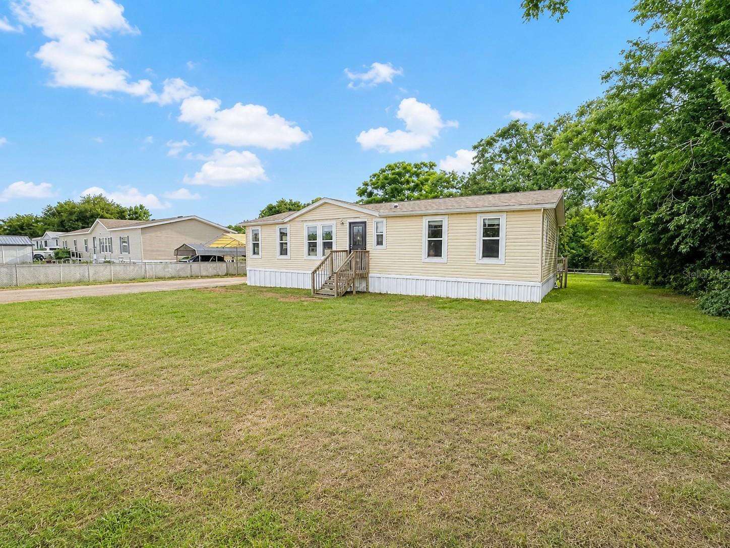 Spacious Doublewide Mobile Home located in the Belleview Hills Estate  of Summerfield is now for sale. This home features 2 spacious bedrooms and 2 full baths. Enjoy family gatherings in the large family room. The kitchen has plenty of cabinet storage and leads to the dinette and living room areas. Enjoy the large fully fenced yard featuring a large shed with additional storage.
The home is being Sold in As Is condition without any Warranty nor Guarantee by seller. The buyer is responsible for verifying ALL property information, room sizes, utilities and condition. 
HUD CASE: 091-775191
FINANCE ESCROW MAY APPLY FINANCE CODE: IE