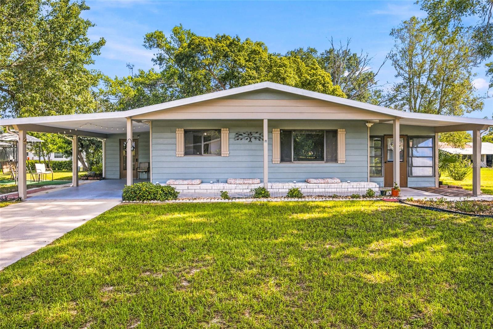 Skip the projects and start enjoying Florida!
One of the most updated homes currently available in Pine Run Estates, this 2-bedroom, 2-bath home combines value, comfort, and peace of mind with a brand-new roof installed in June 2026, luxury vinyl plank flooring throughout, a remodeled primary bathroom, granite countertops, newer stainless steel appliances, and a spacious Florida room perfect for relaxing year-round.
With 1,304 square feet of living space, an updated laundry room, covered carport, and many of the major improvements already completed, this is the kind of home buyers hope to find but rarely do.
Enjoy an active 55+ lifestyle with two clubhouses, pools, fitness facilities, social activities, and a convenient location just minutes from shopping, dining, and medical services.